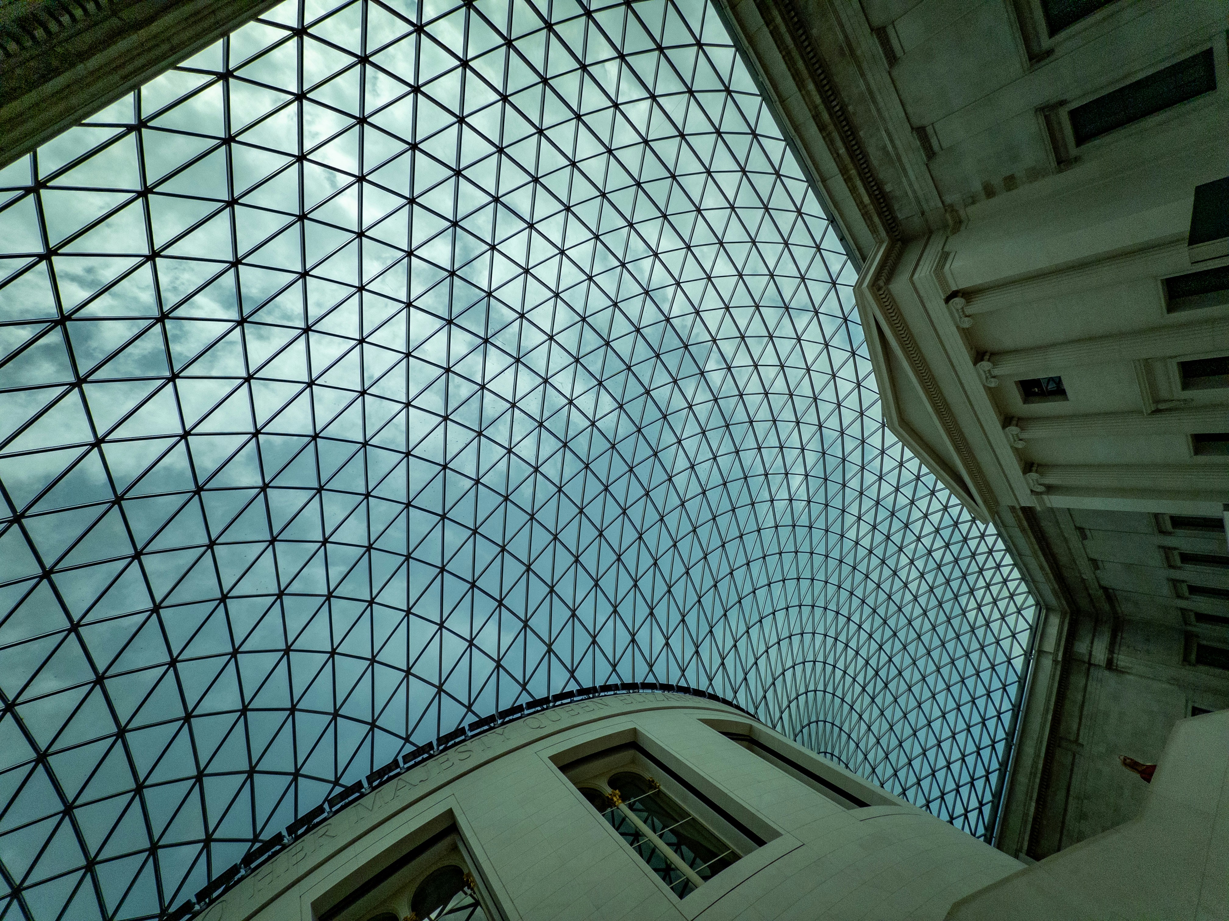 The glass and steel lattice roof of the Great Court at the British Museum