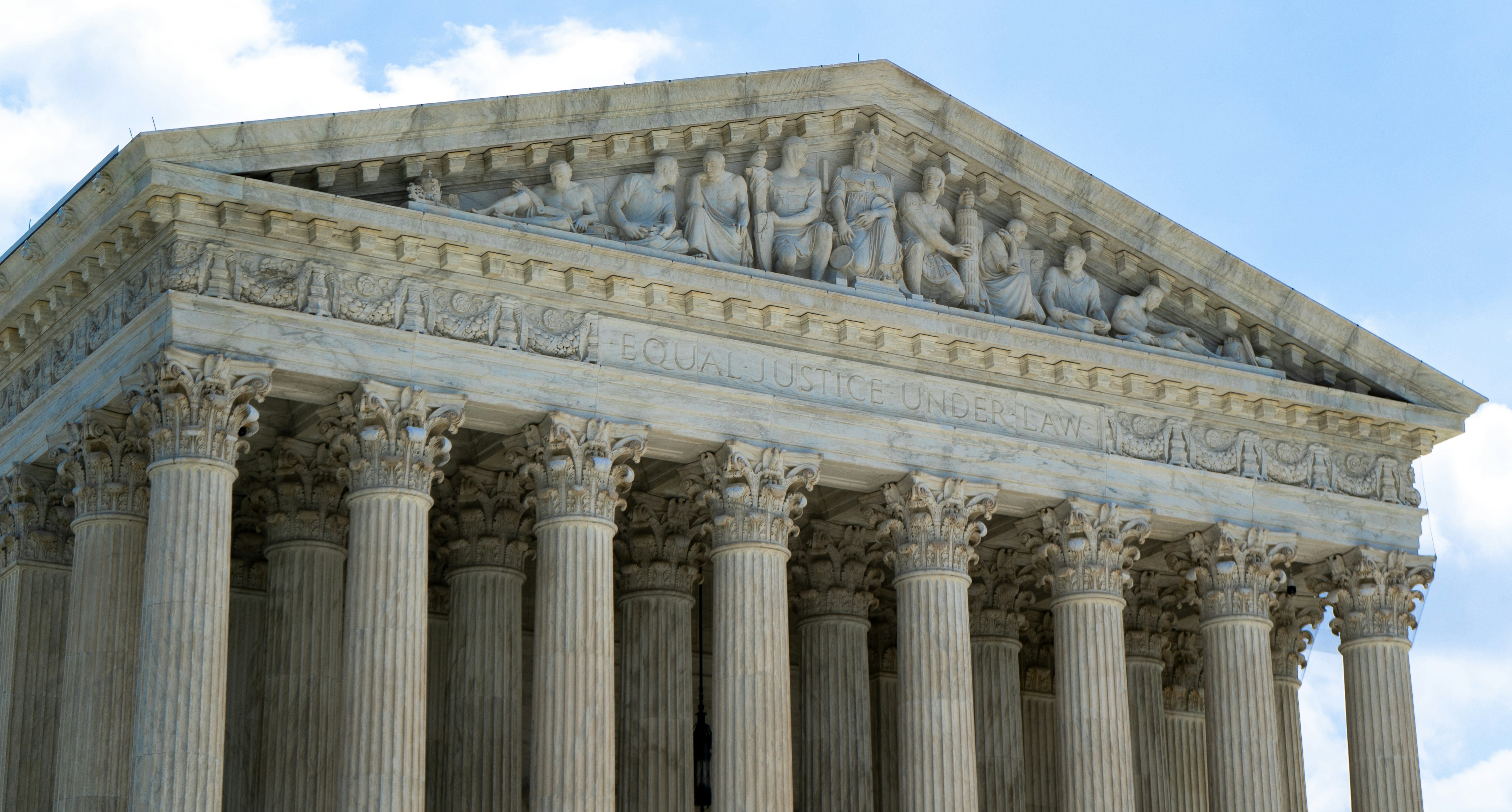 The Supreme Court building pediment with the inscription Equal Justice Under Law in Washington