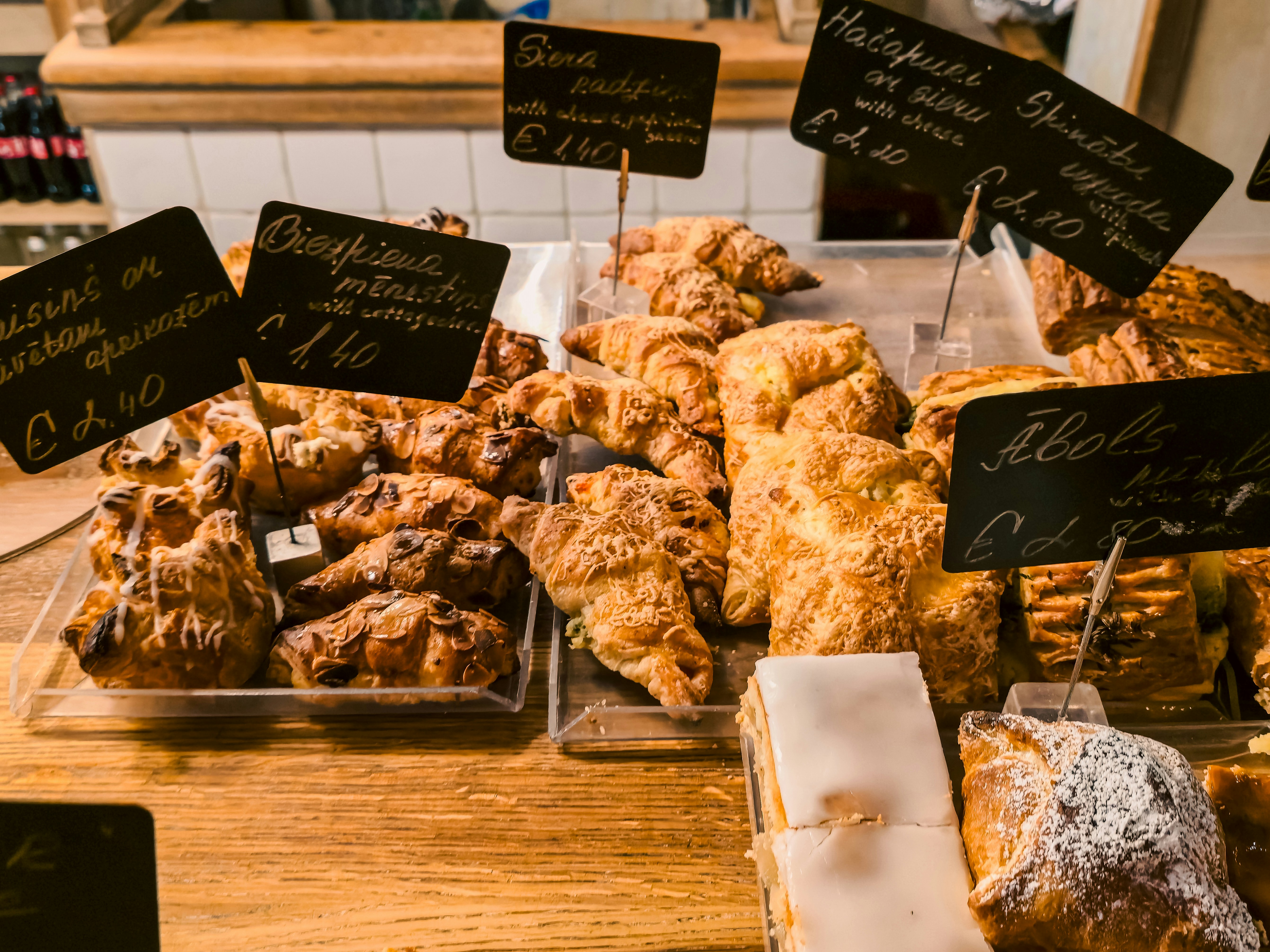 Golden pastries on a wooden bakery counter