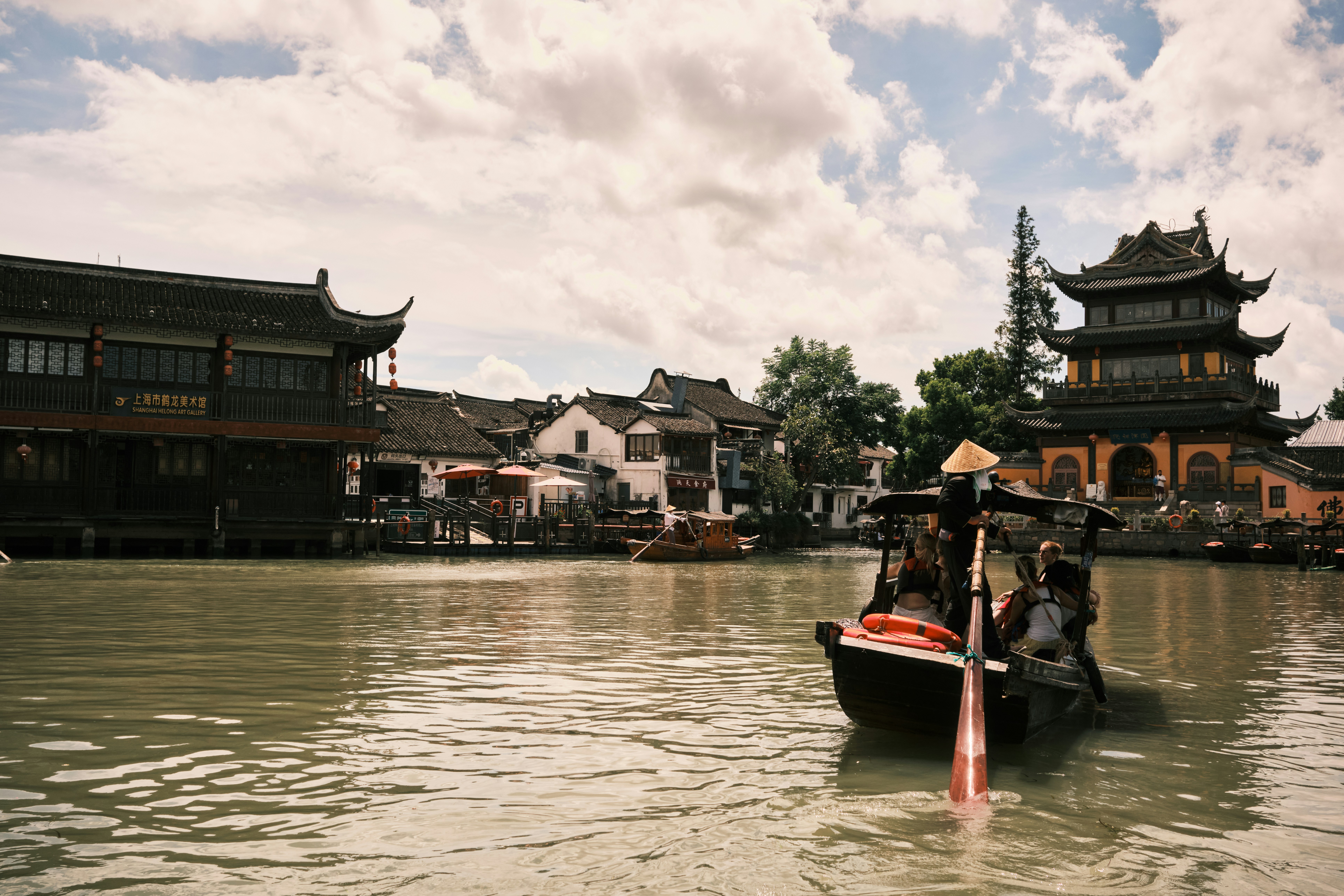 Boat on canal in Zhujiajiao - Free Photo on Unsplash