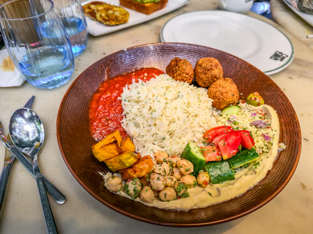 Typical falafel plate with hummus and rice