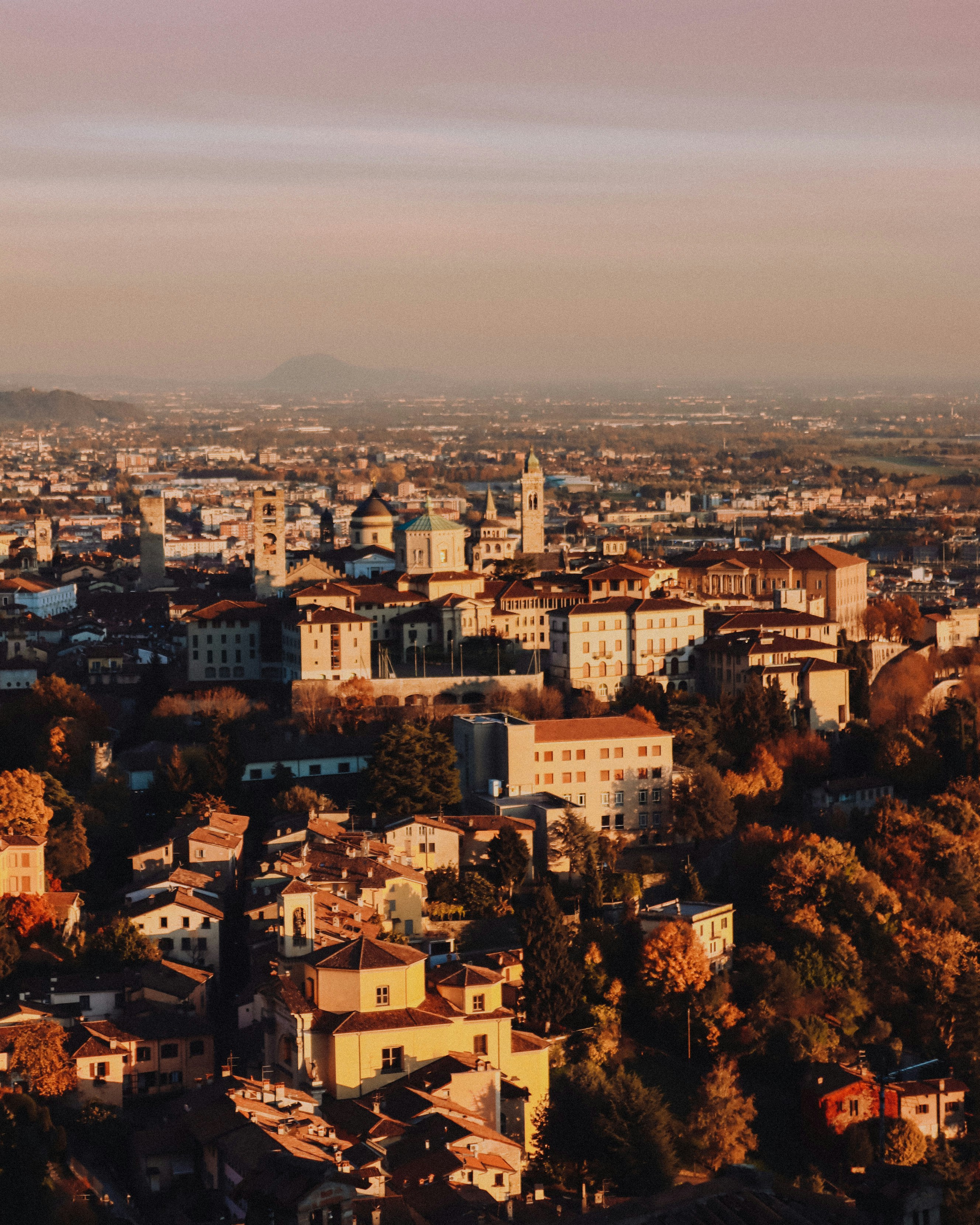 Aerial view of the historic city of Bergamo in Italy during golden hour