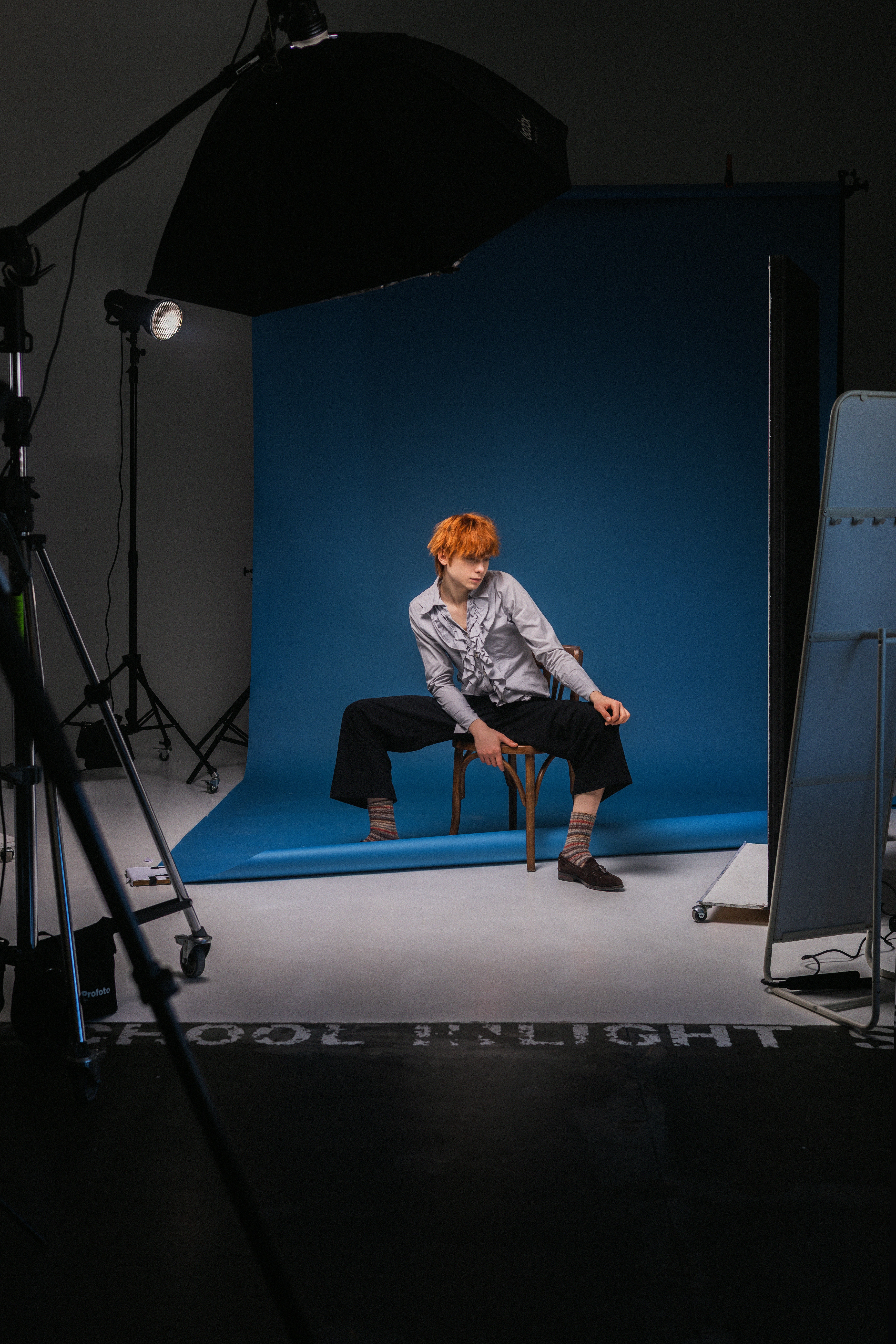 Creative director working on digital content in a modern studio environment