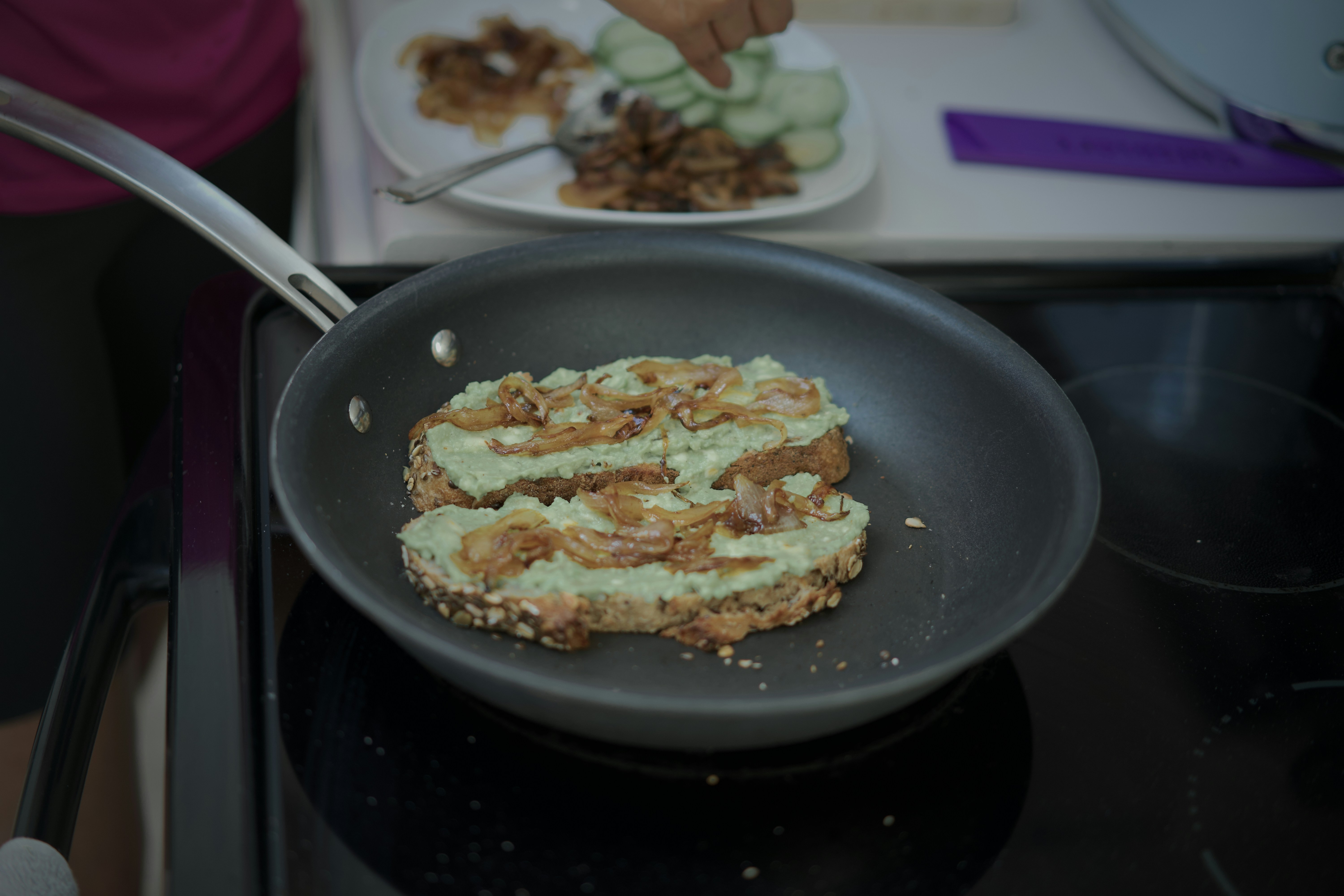 Avocado toast cooking in a pan