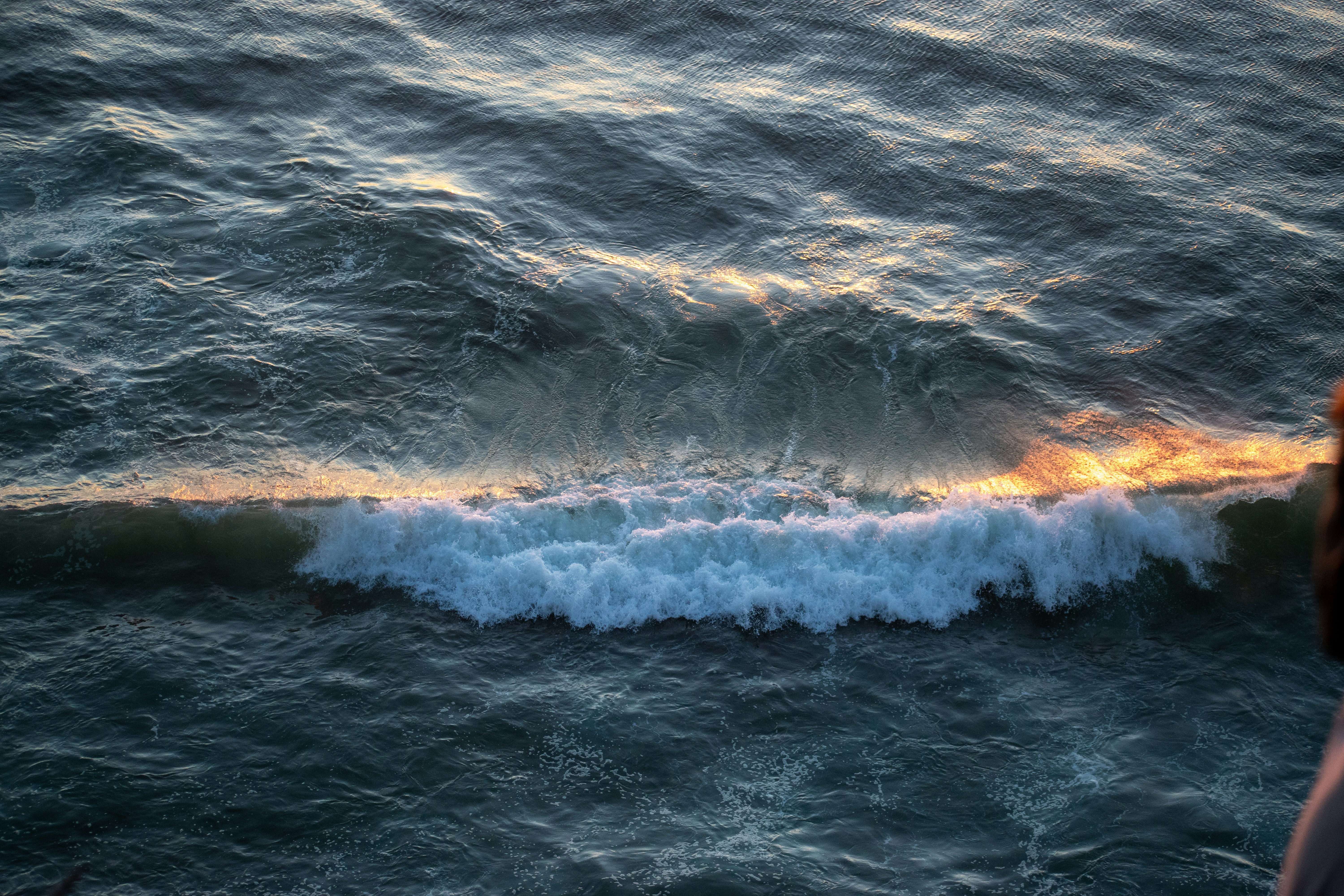 Starship vehicle engulfed in flames on ocean surface