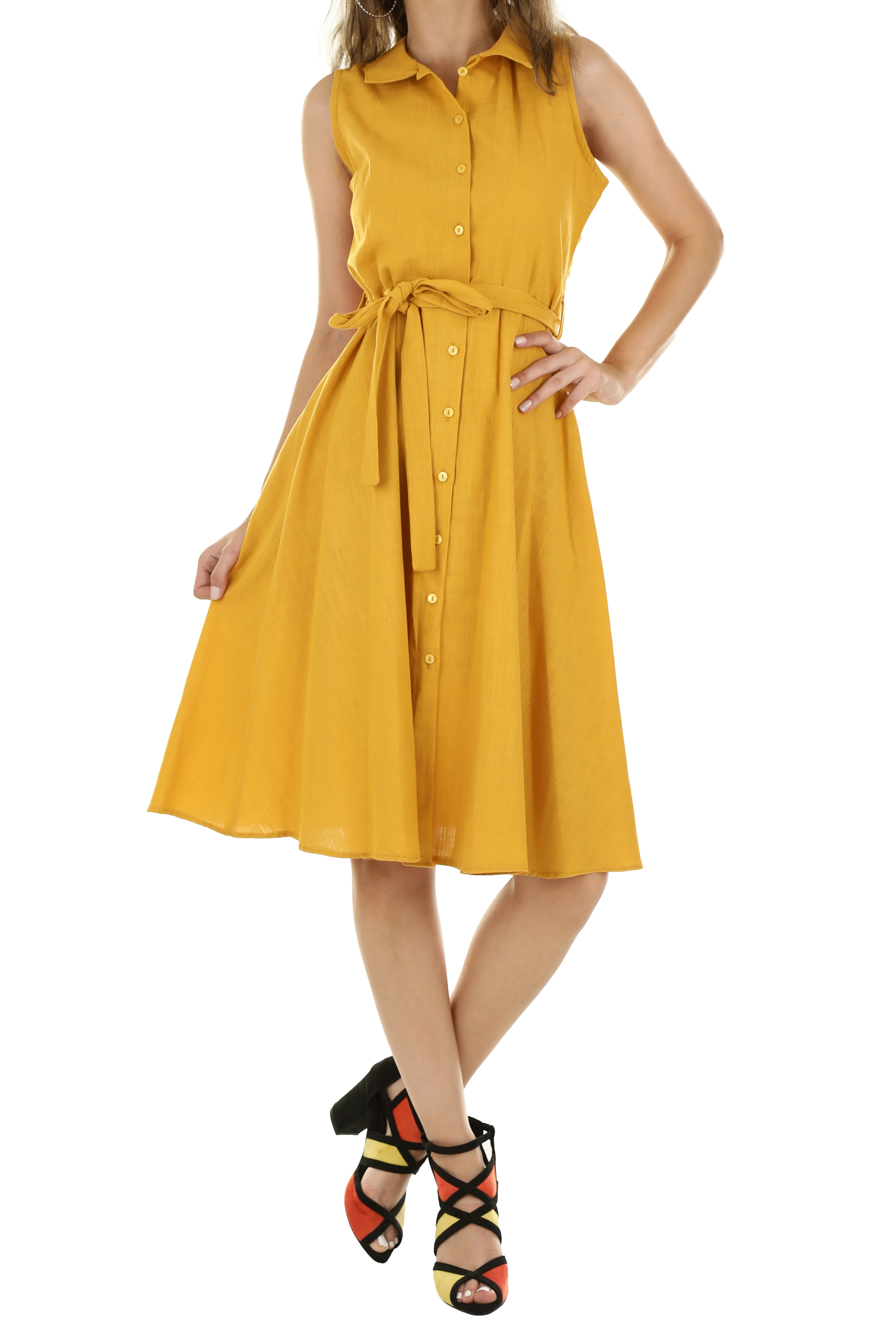 A person wearing a sleeveless yellow button-down dress with a tie waist