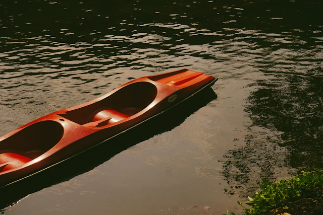 Red kayak on the water