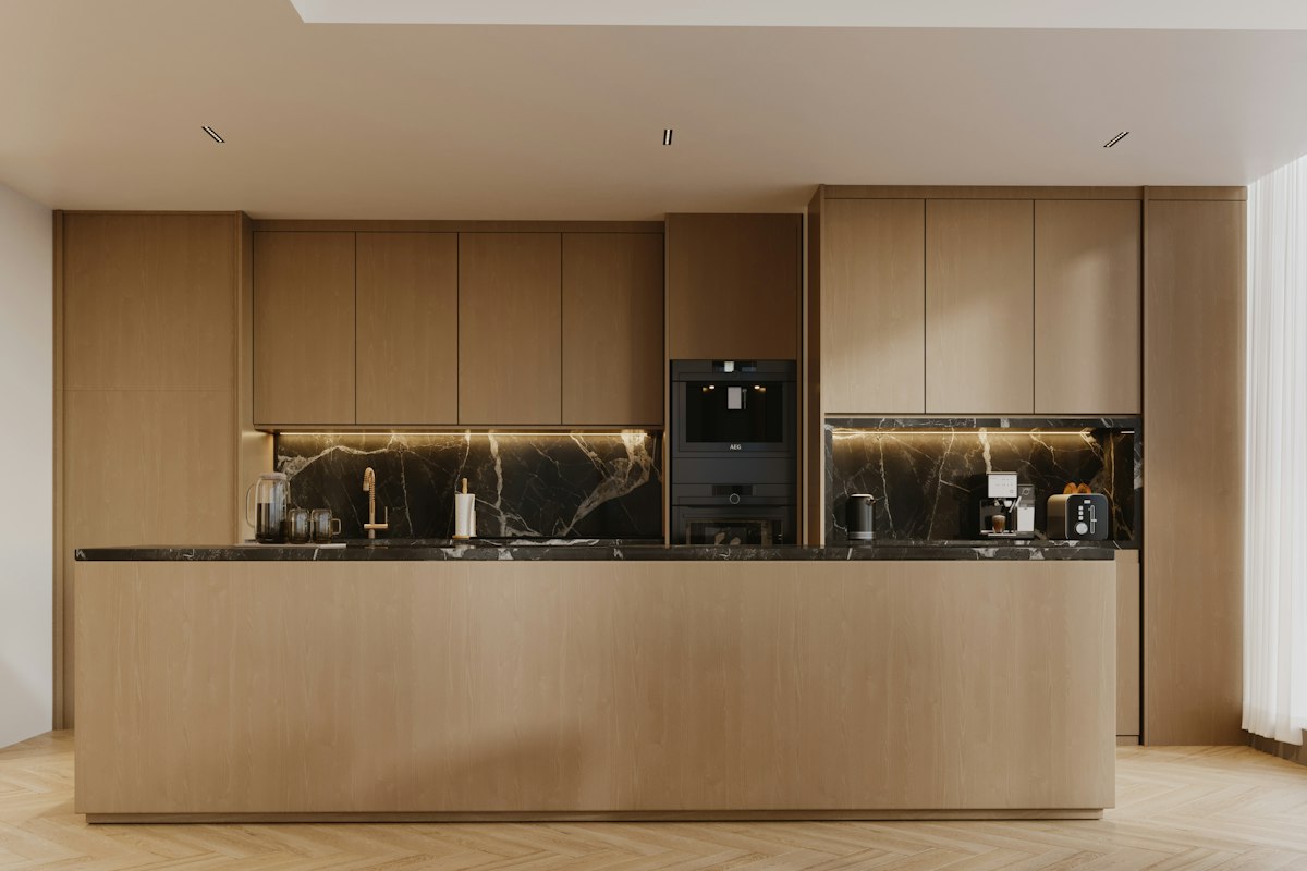 Small modern kitchen with light wood cabinets
