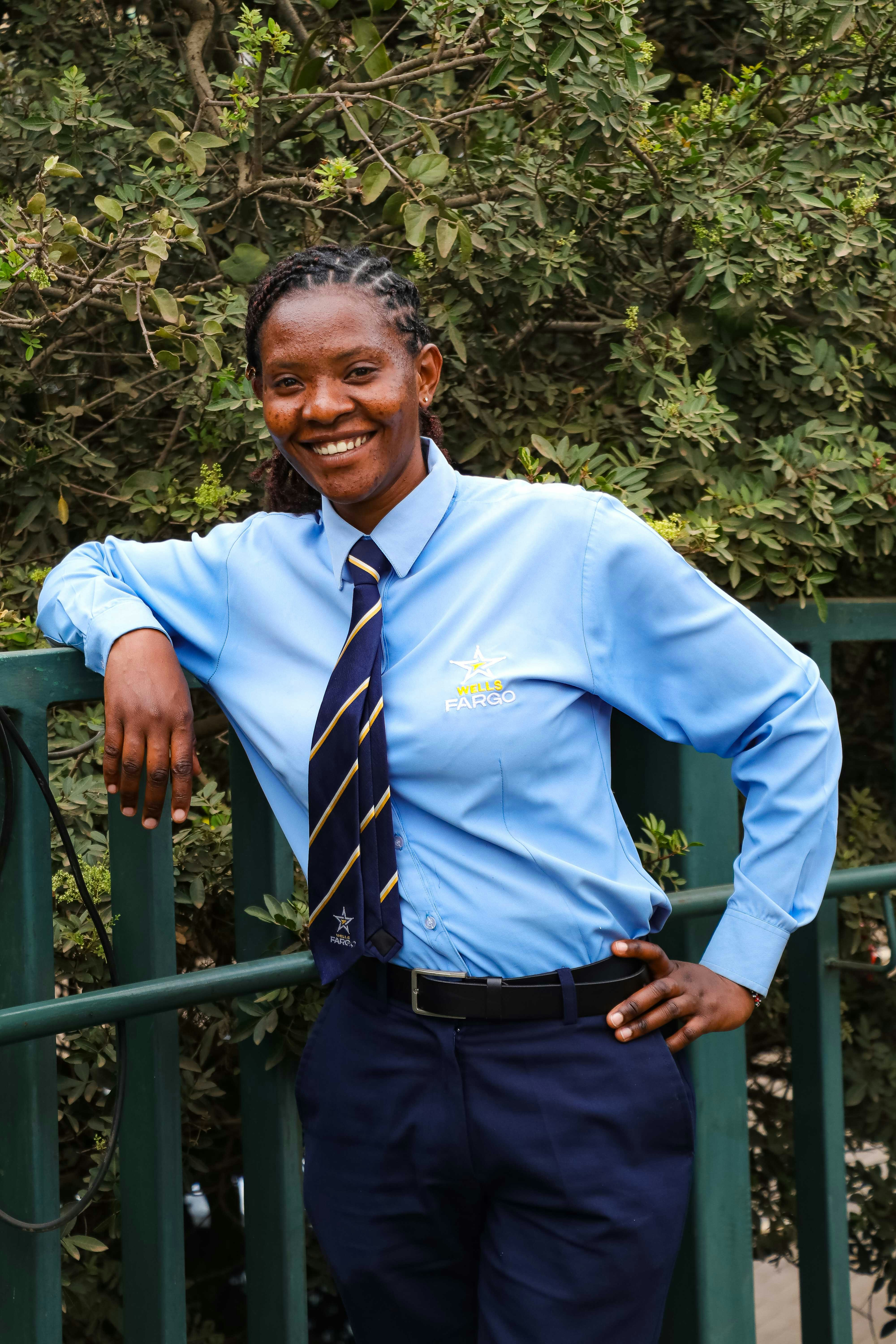 Professional wearing an embroidered company uniform shirt