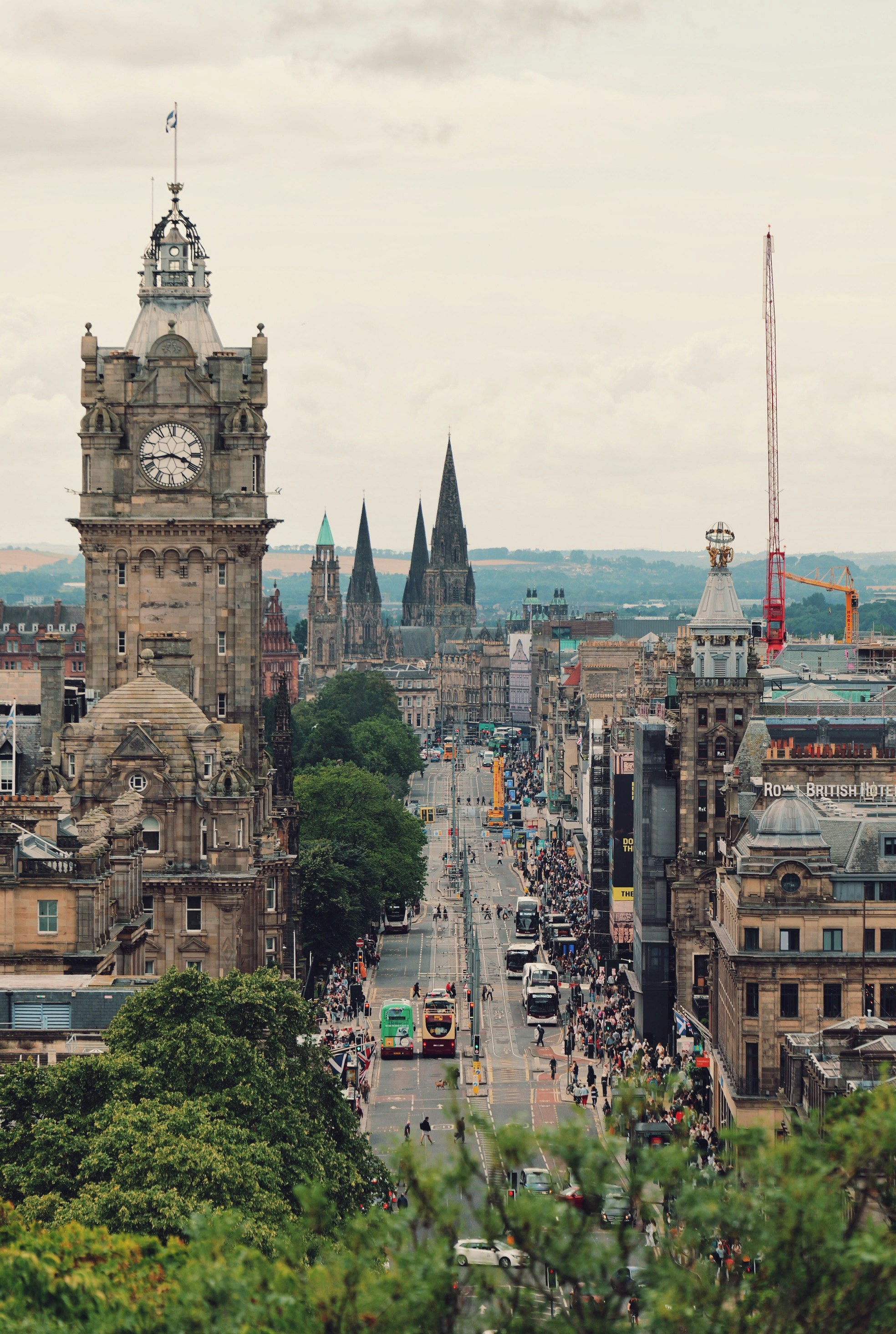 The Balmoral Hotel clock tower overlooking Princes Street in Edinburgh with historic spires