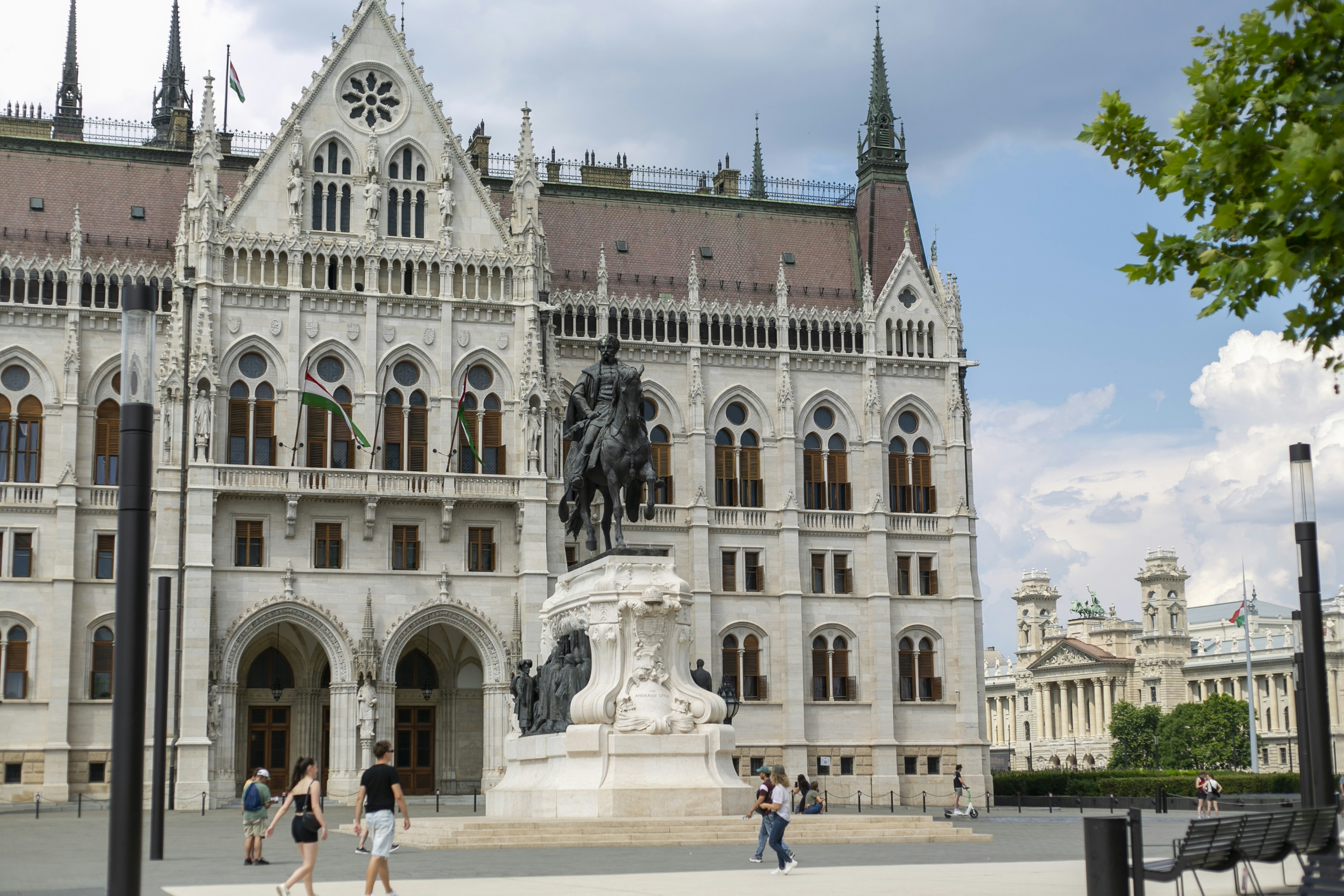 The Hungarian Parliament Building with an equestrian statue in Budapest