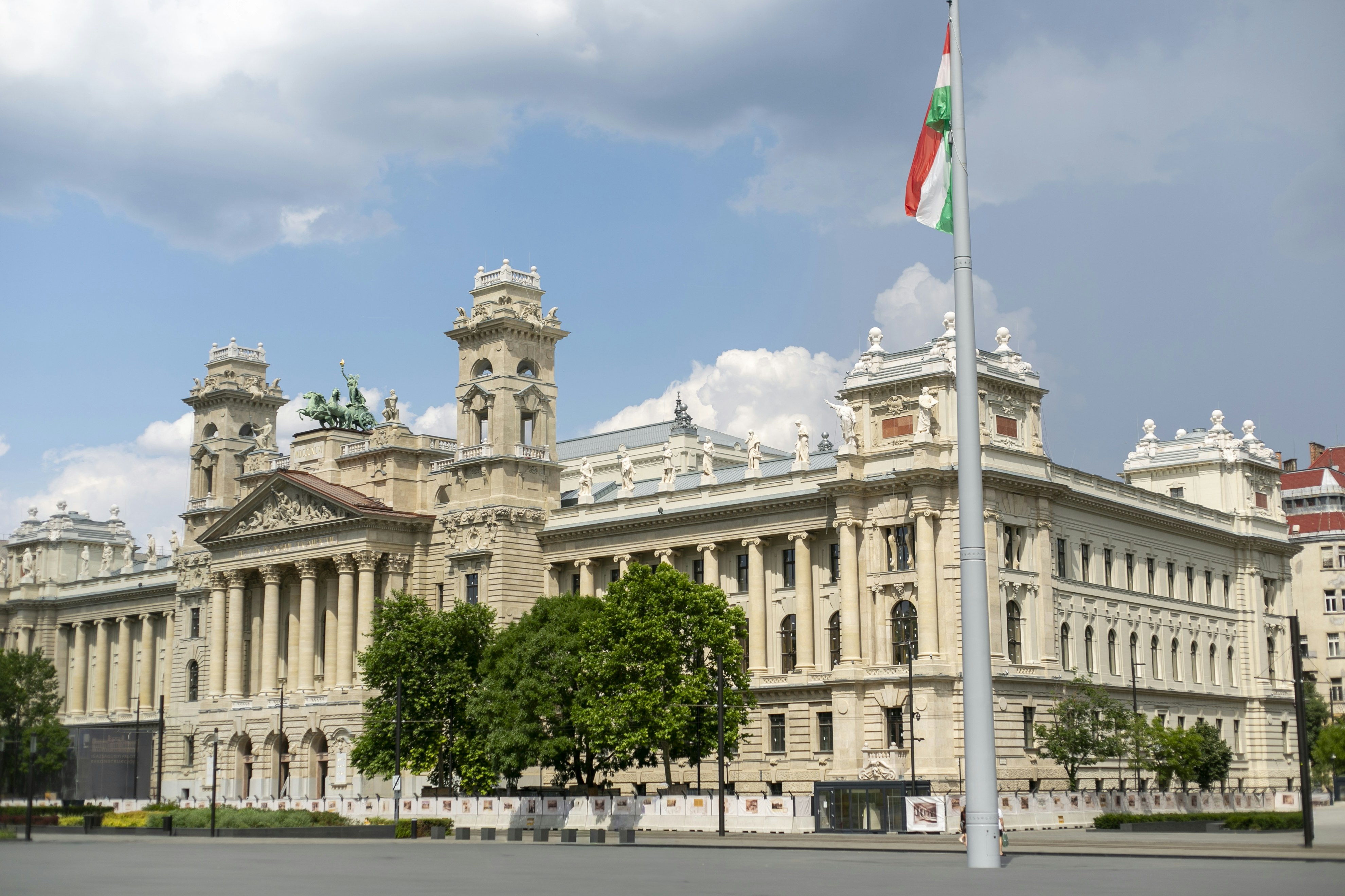 The Hungarian State Opera House in Budapest with a Hungarian flag on a pole