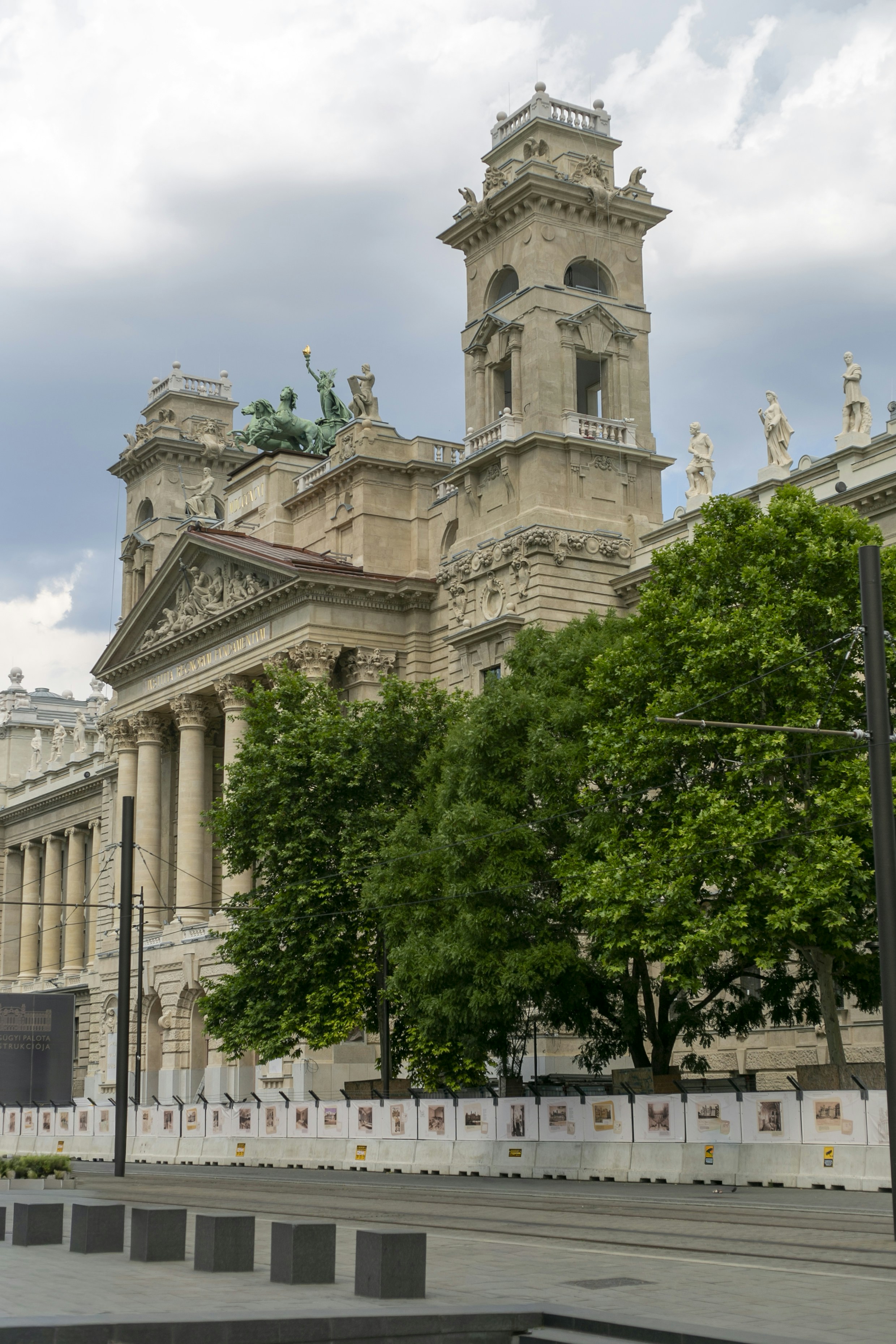 The Ethnographic Museum building with neoclassical architecture and statues in Budapest
