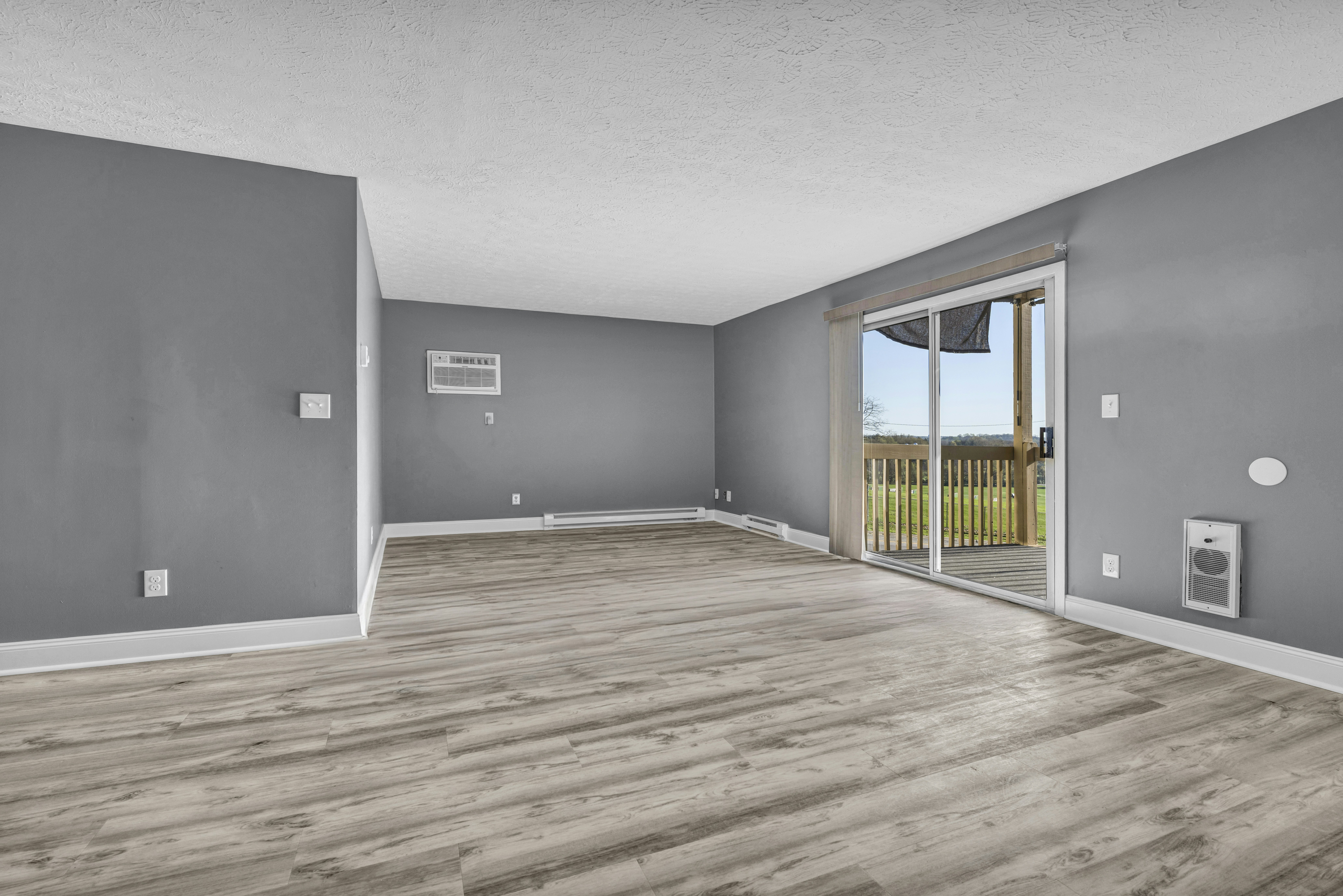Living room with an aluminium sliding door to the balcony