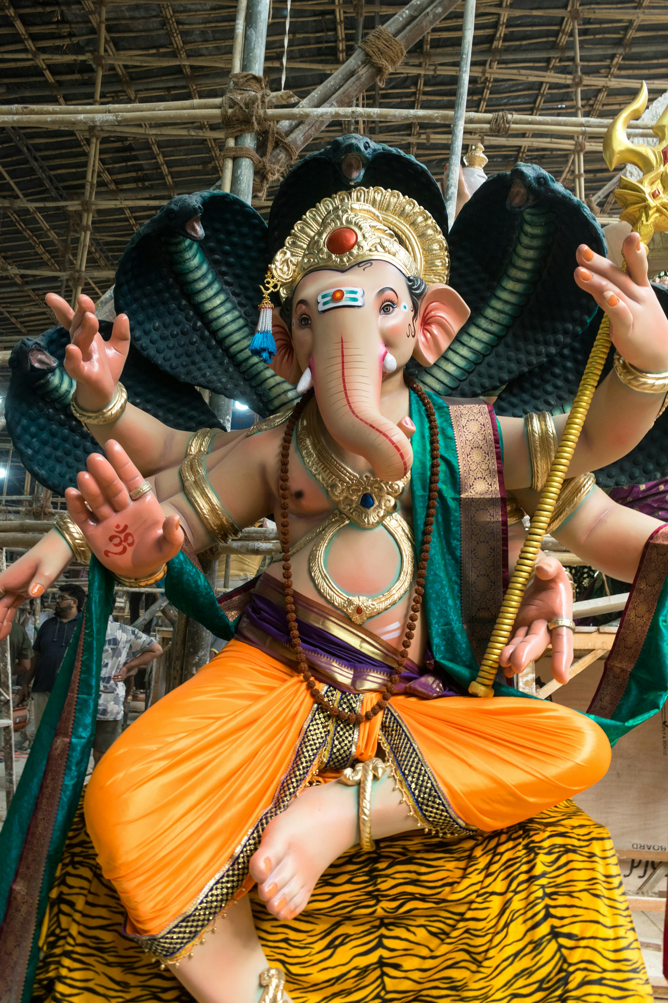 A large statue of Lord Ganesha with multiple arms in Mumbai, India