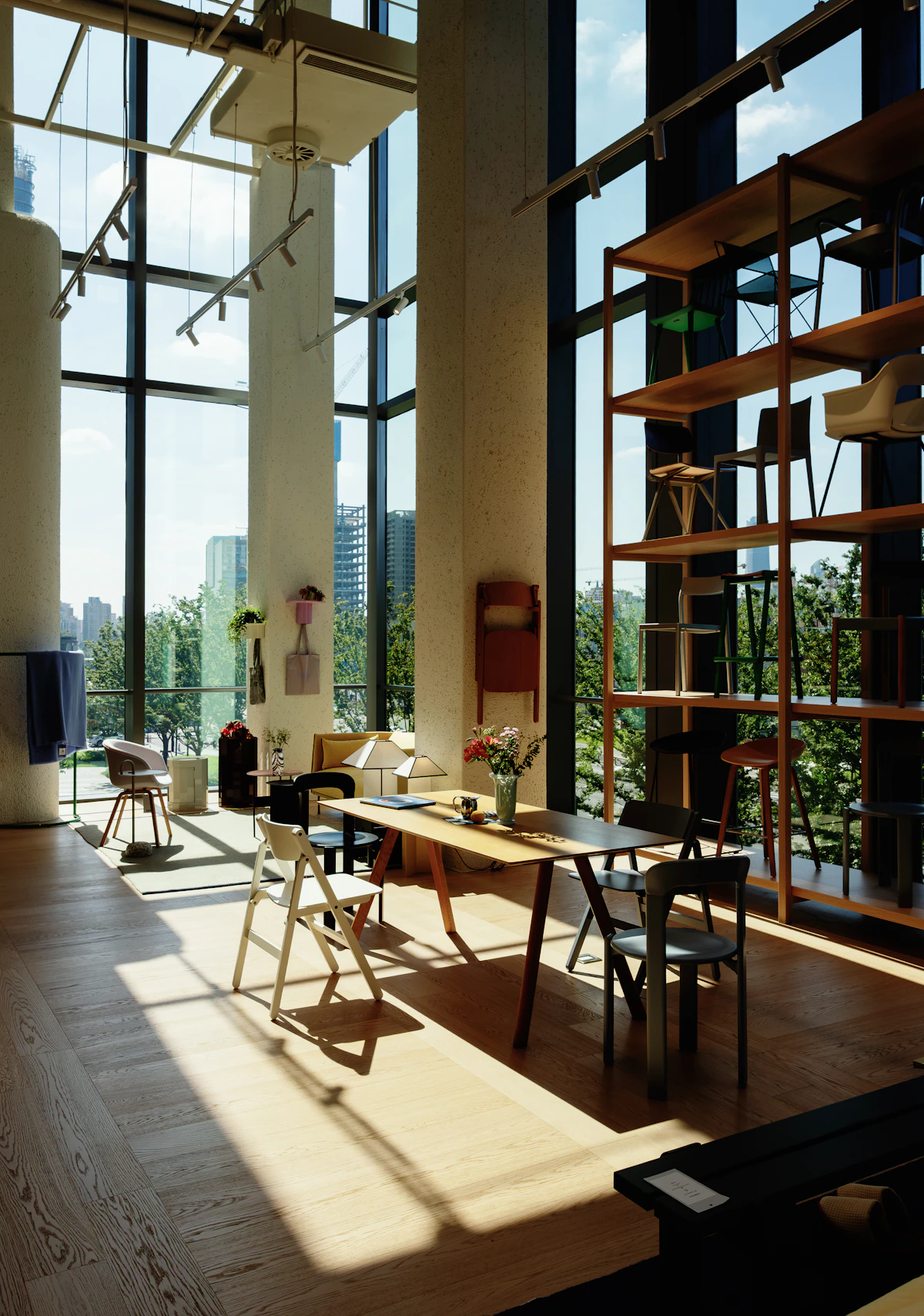 Furniture showroom with wooden tables, chairs and shelving