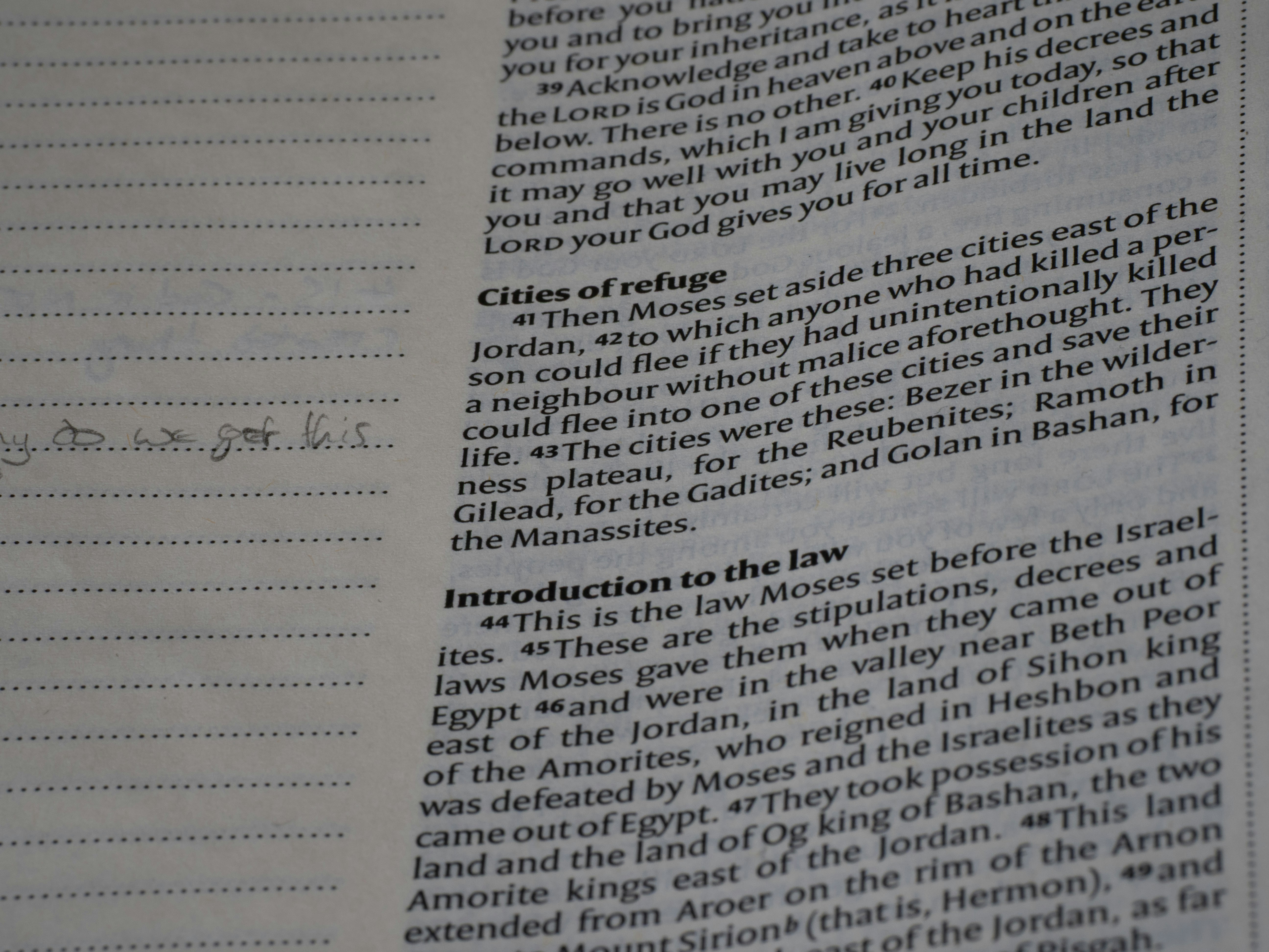A page of printed text from a religious book with handwritten notes