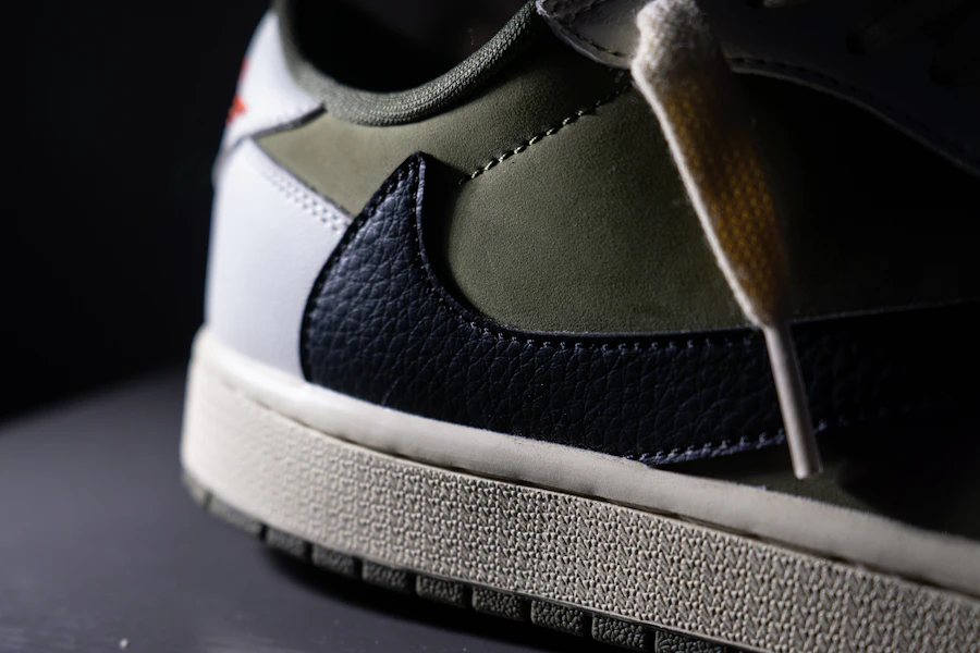 Close-up of a green leather sneaker