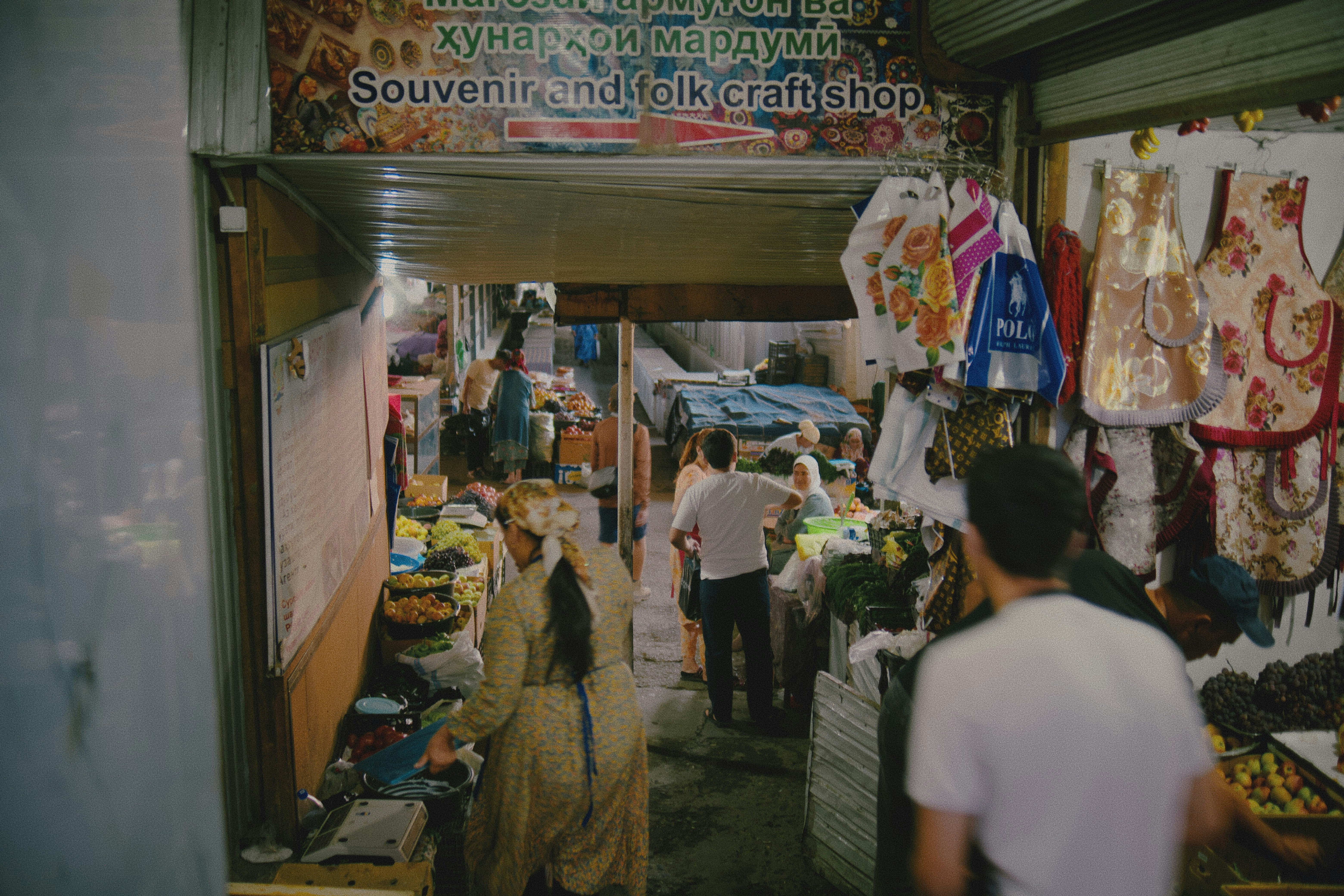 People shopping in a covered market
