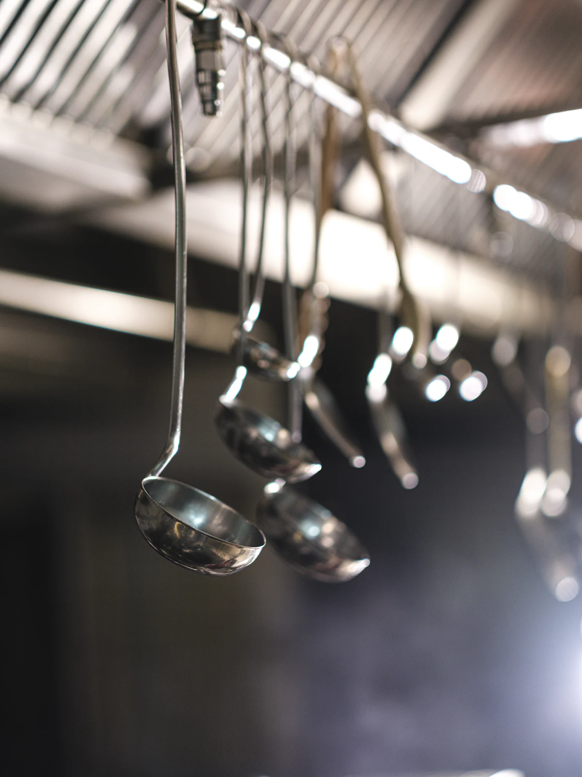 Stainless utensils in a professional kitchen