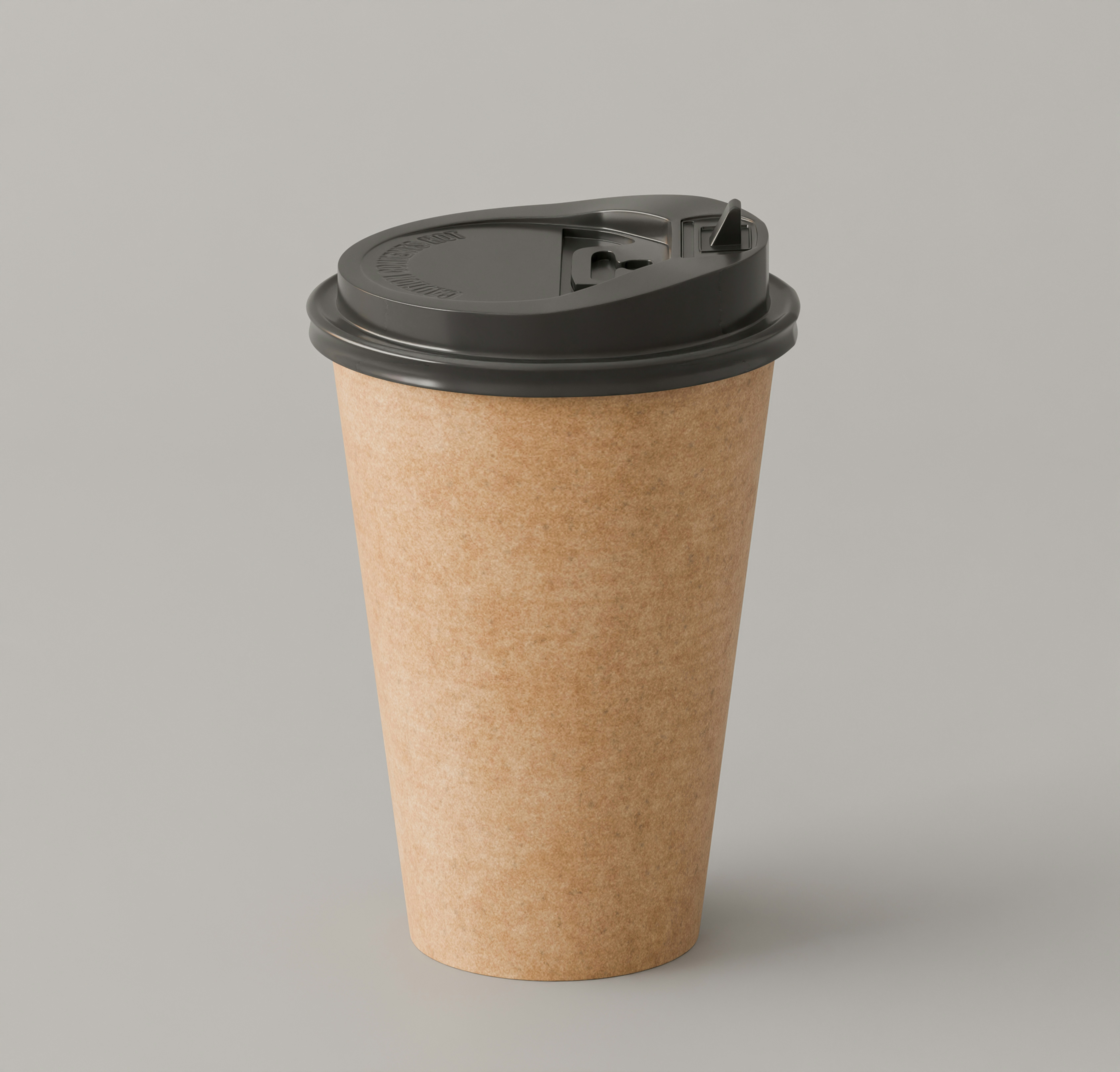 A brown paper coffee cup with a black plastic lid on a grey surface