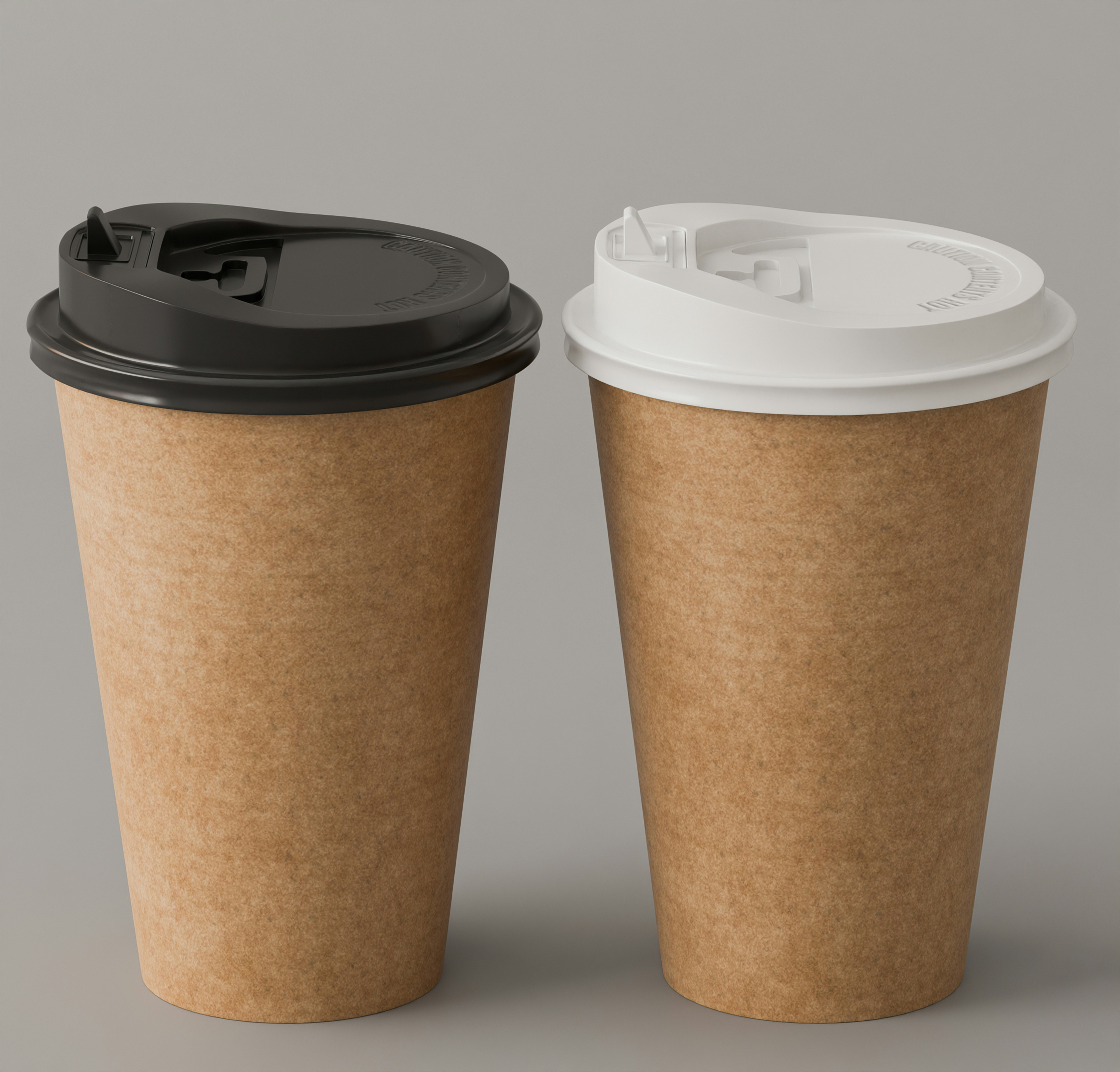 Two brown paper coffee cups with black and white lids on grey