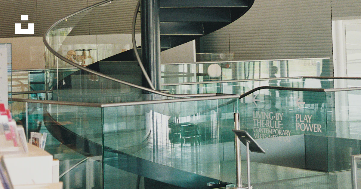 Normal Calendar Design Spiral staircase in modern gallery atrium - Free Photo on Unsplash