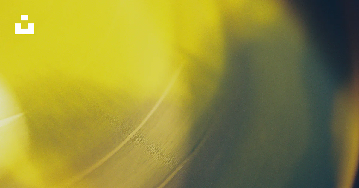 Abstract Recording Icon Vinyl record with yellow light leak - Free Photo on Unsplash