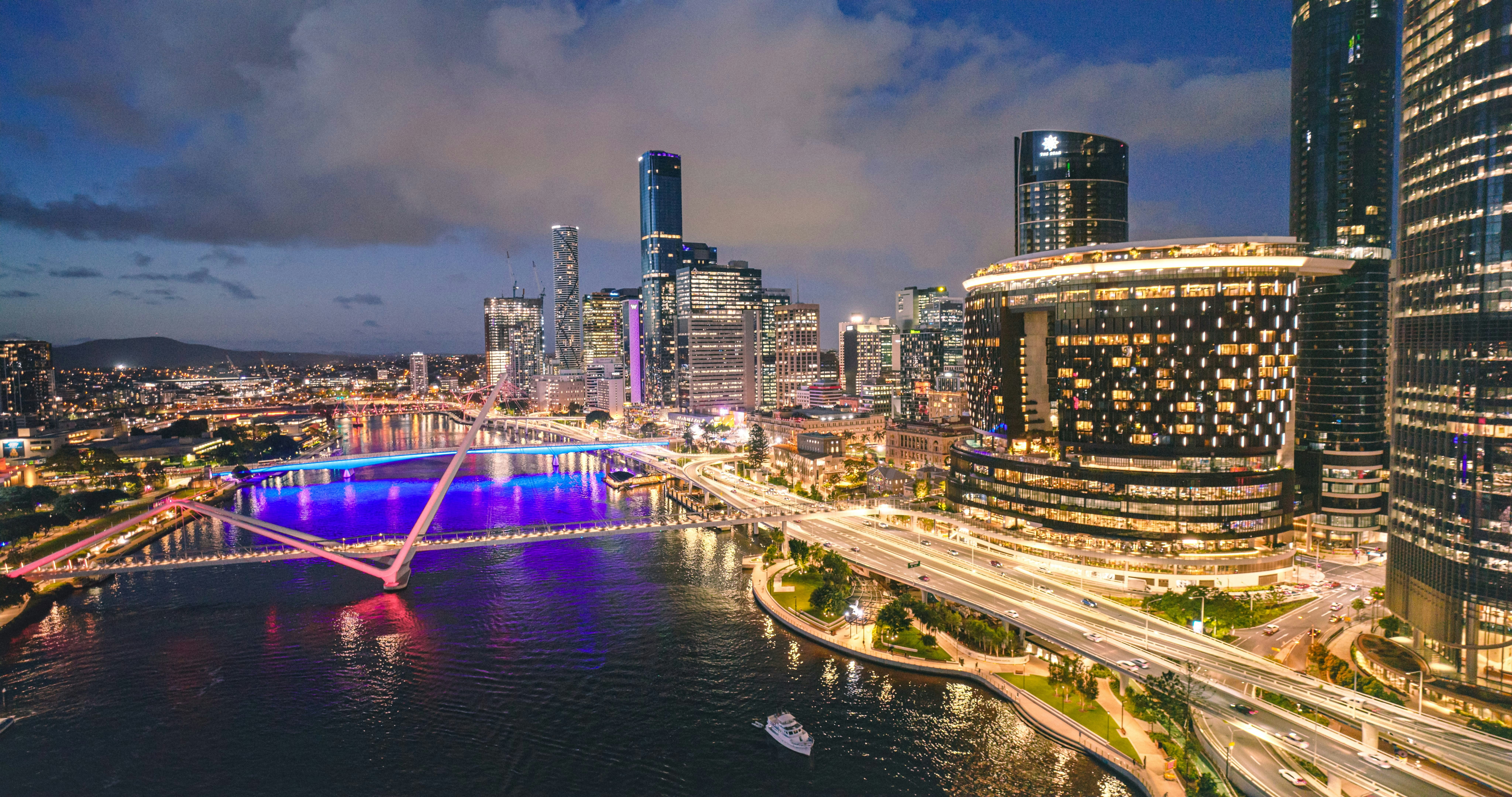View towards The Star and The Neville Bonner bridge at night