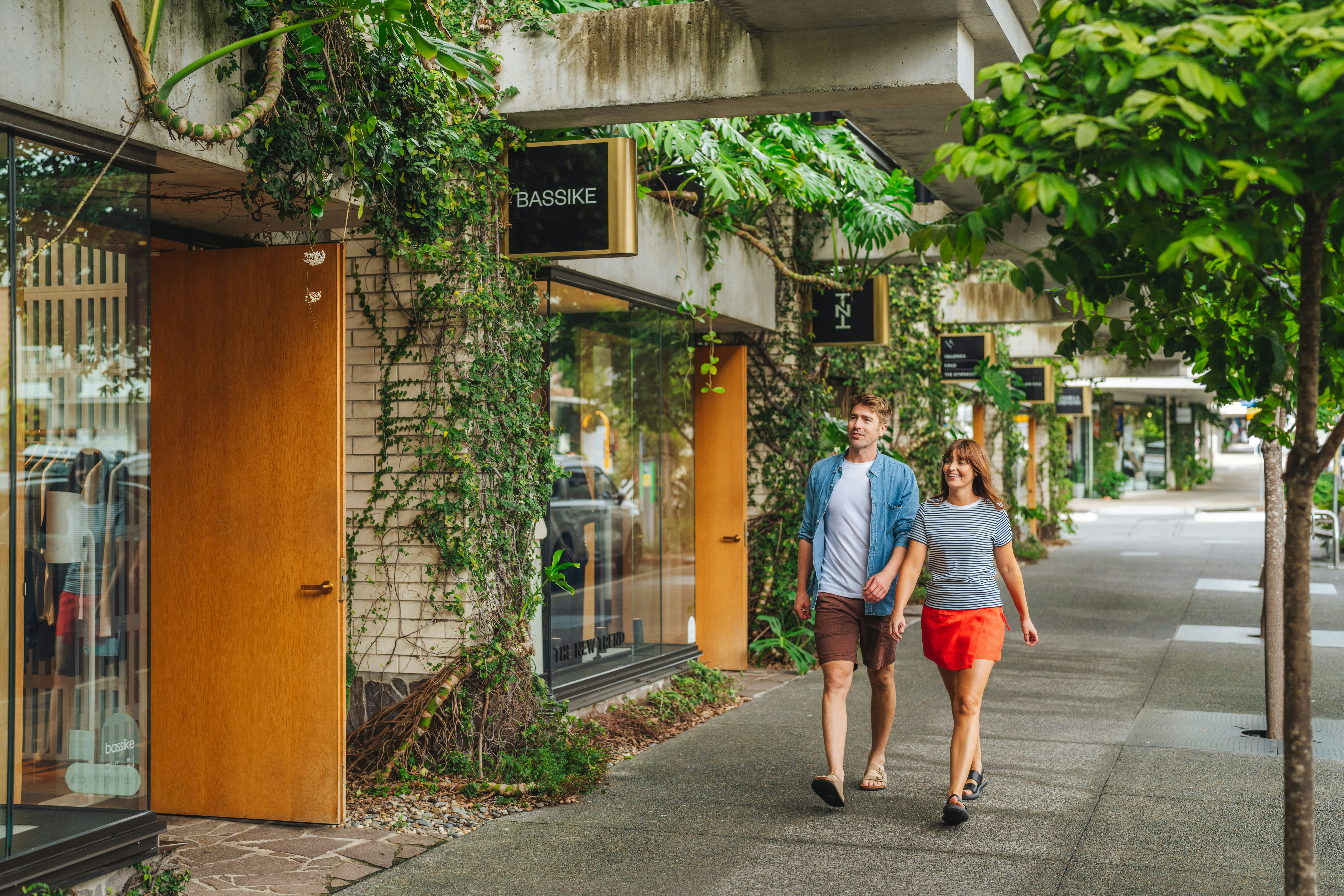 Couple walking through the iconic luxury retail precinct