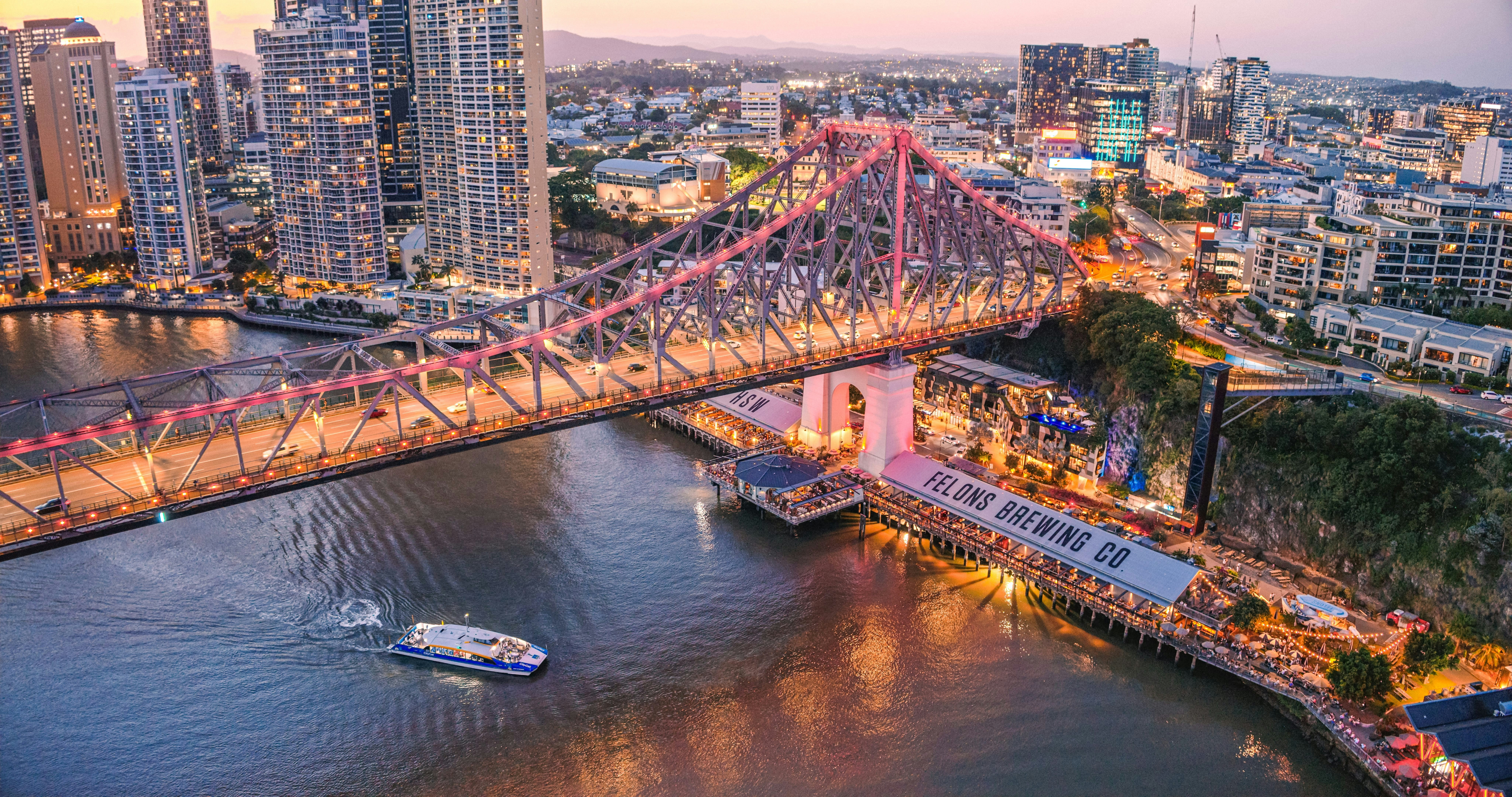 Aerial view of the Story Bridge and Felons Brewing Co in Brisbane at dusk