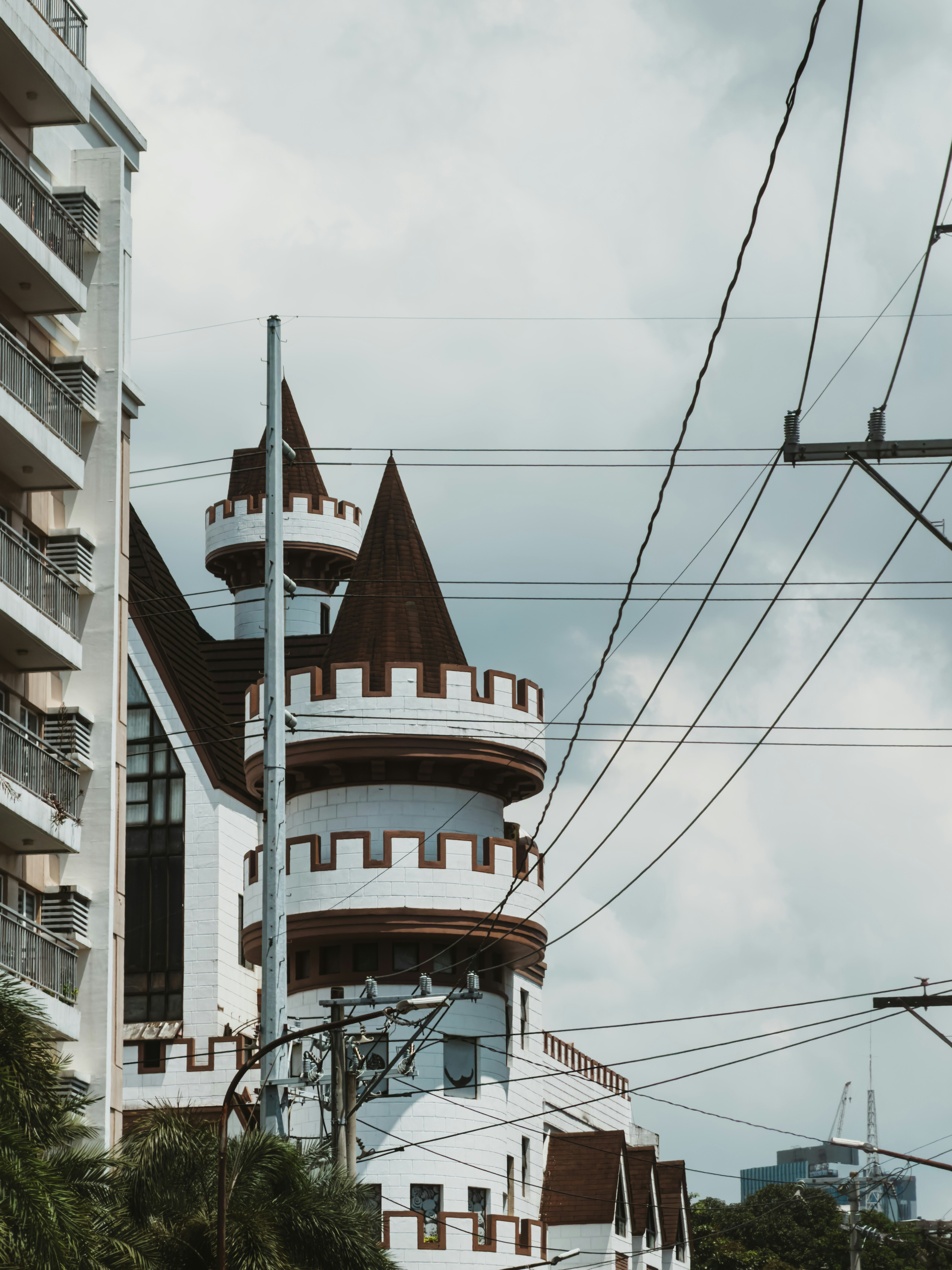 White building with brown castle turrets - Free Photo on Unsplash