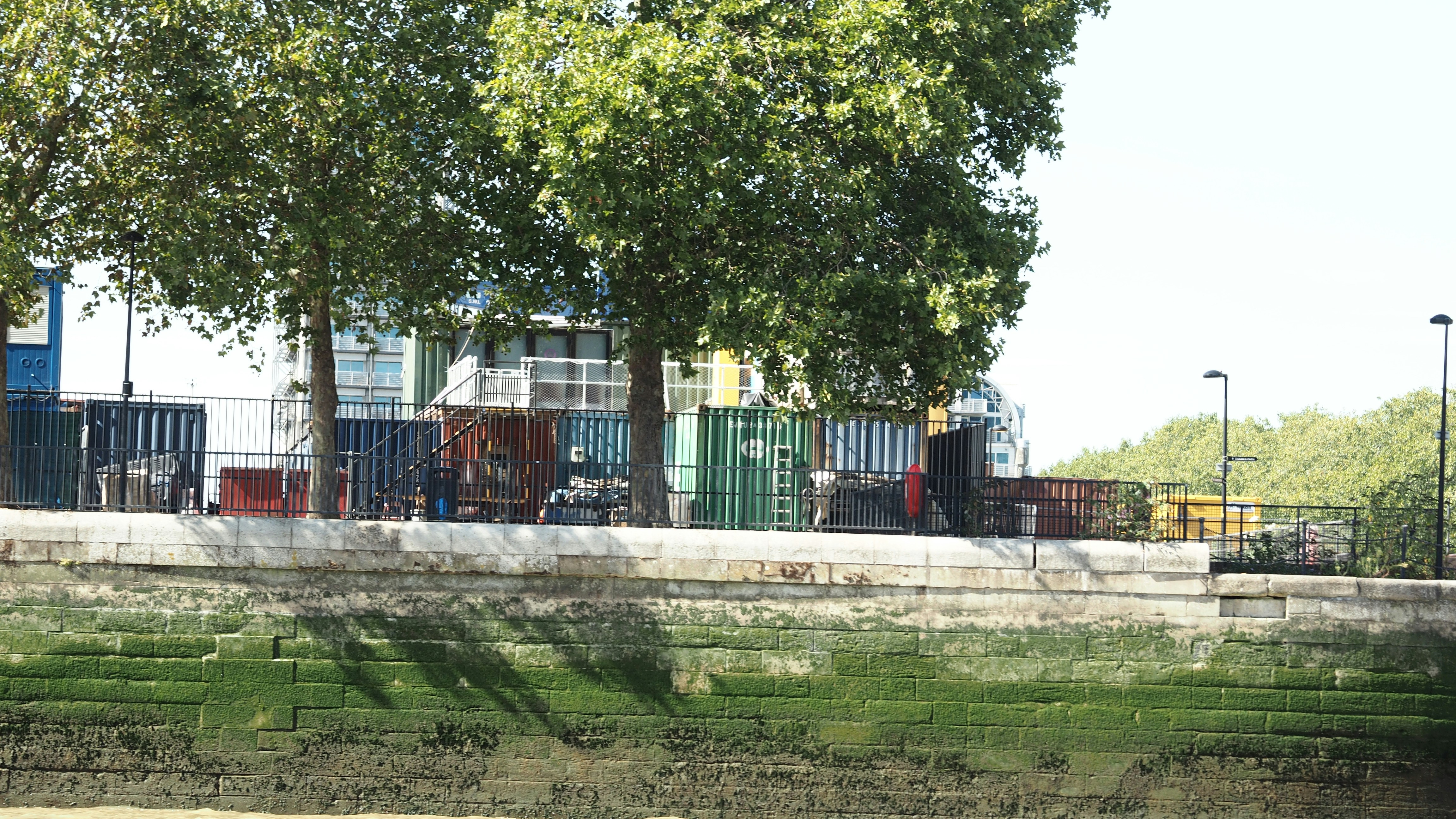 A row of units behind commercial buildings