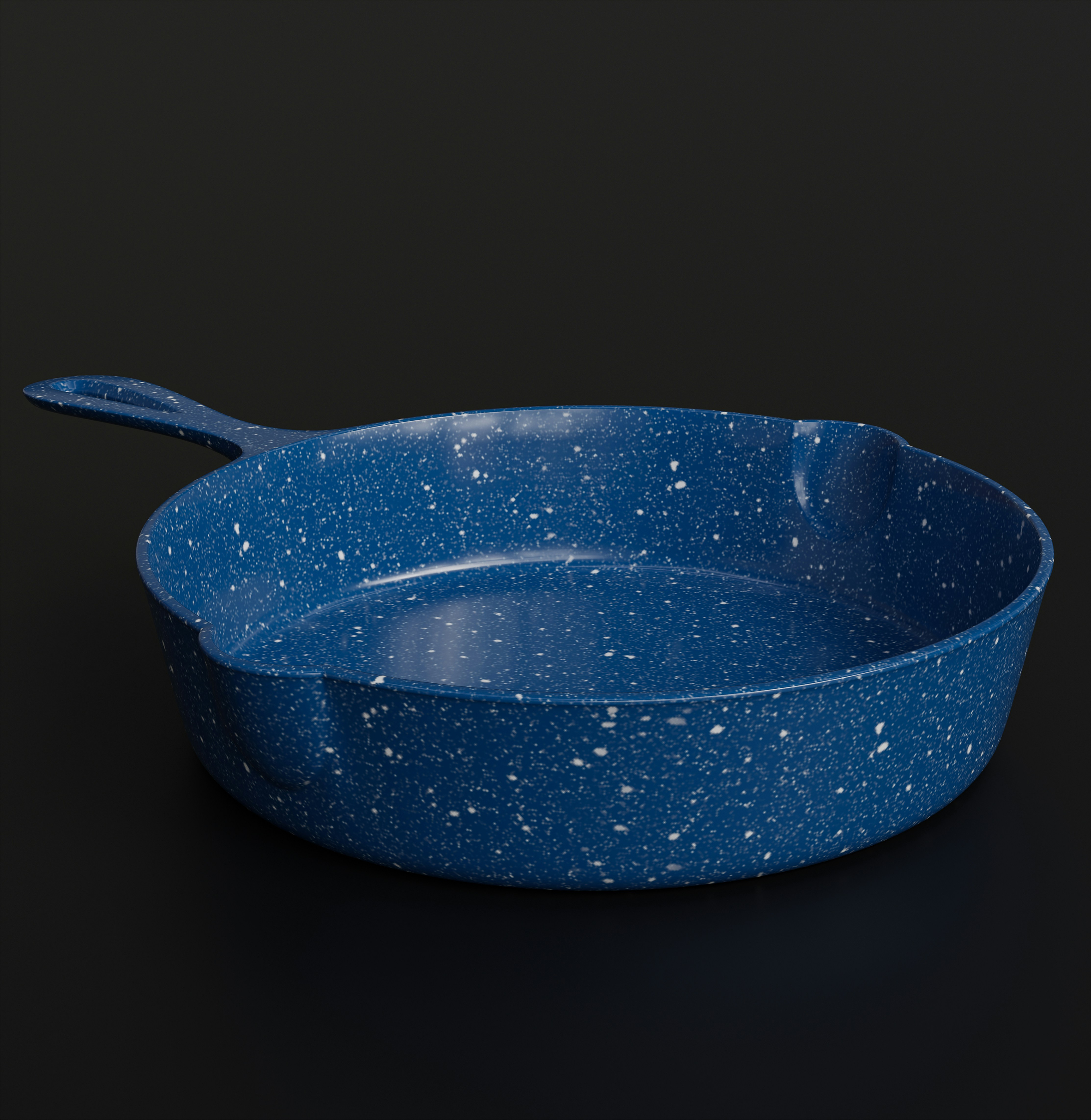 A blue speckled enamel skillet on a dark background