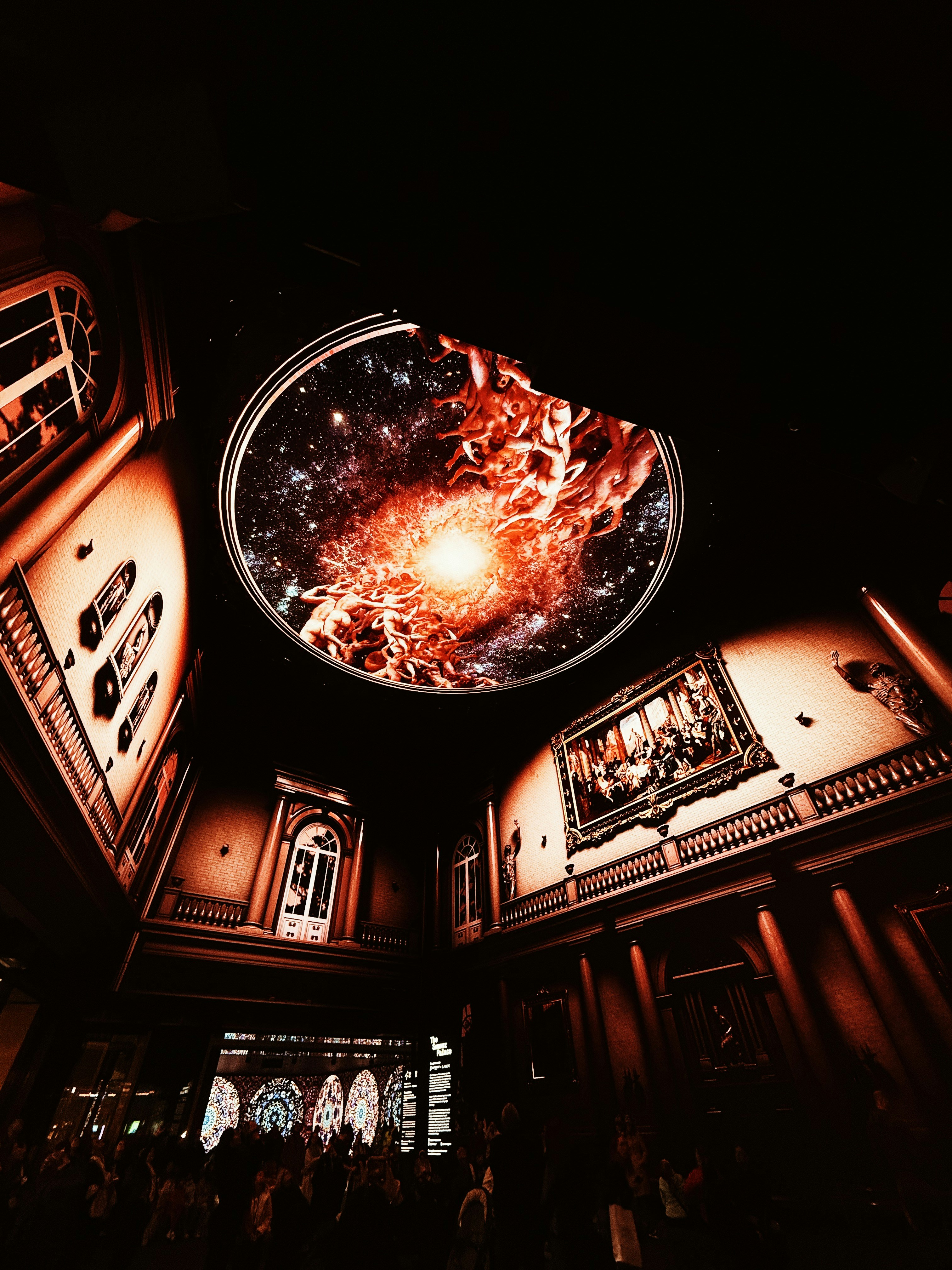 A galaxy shown on the domed ceiling of a planetarium