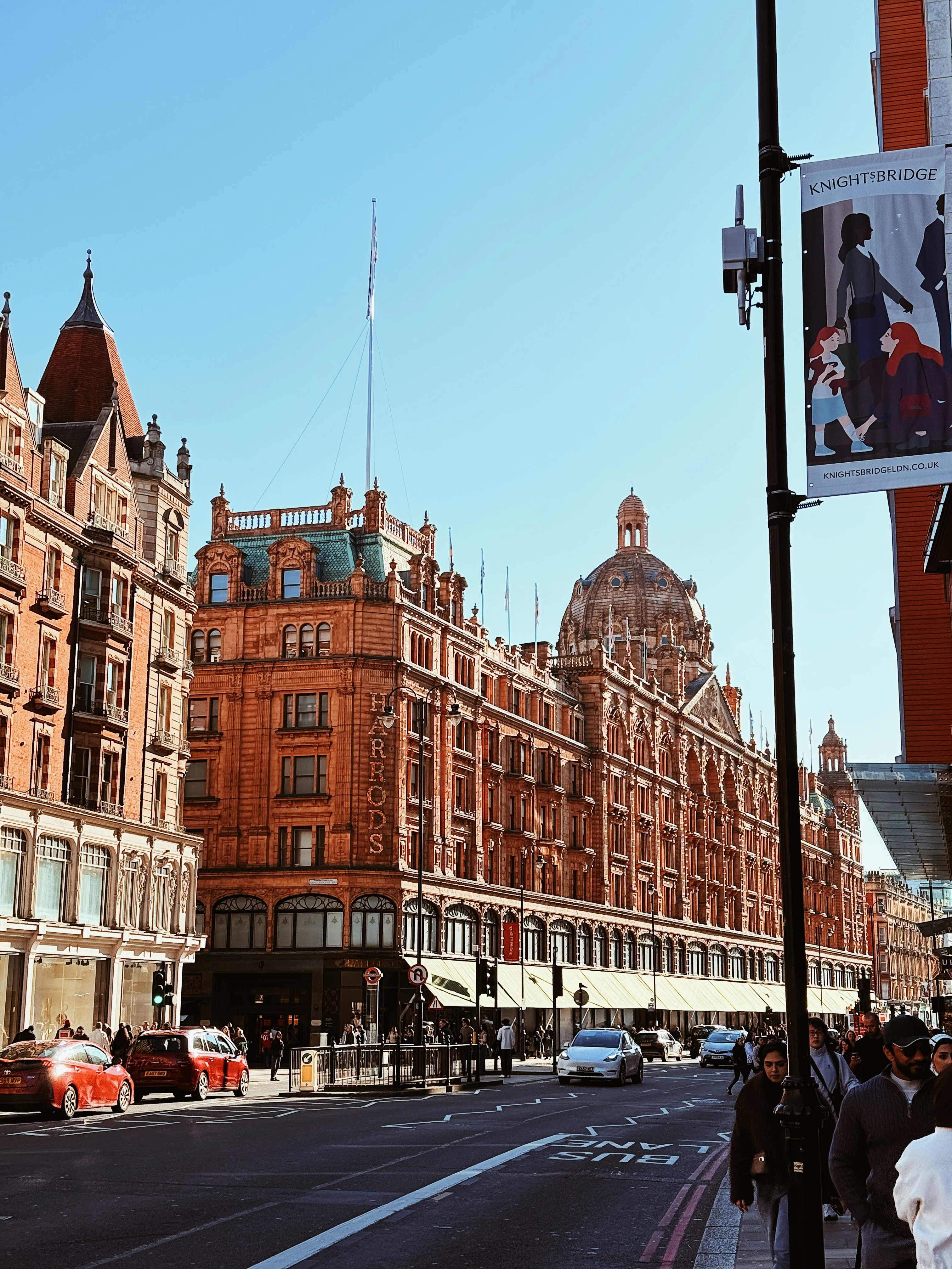 The Harrods department store building on a sunny street in London