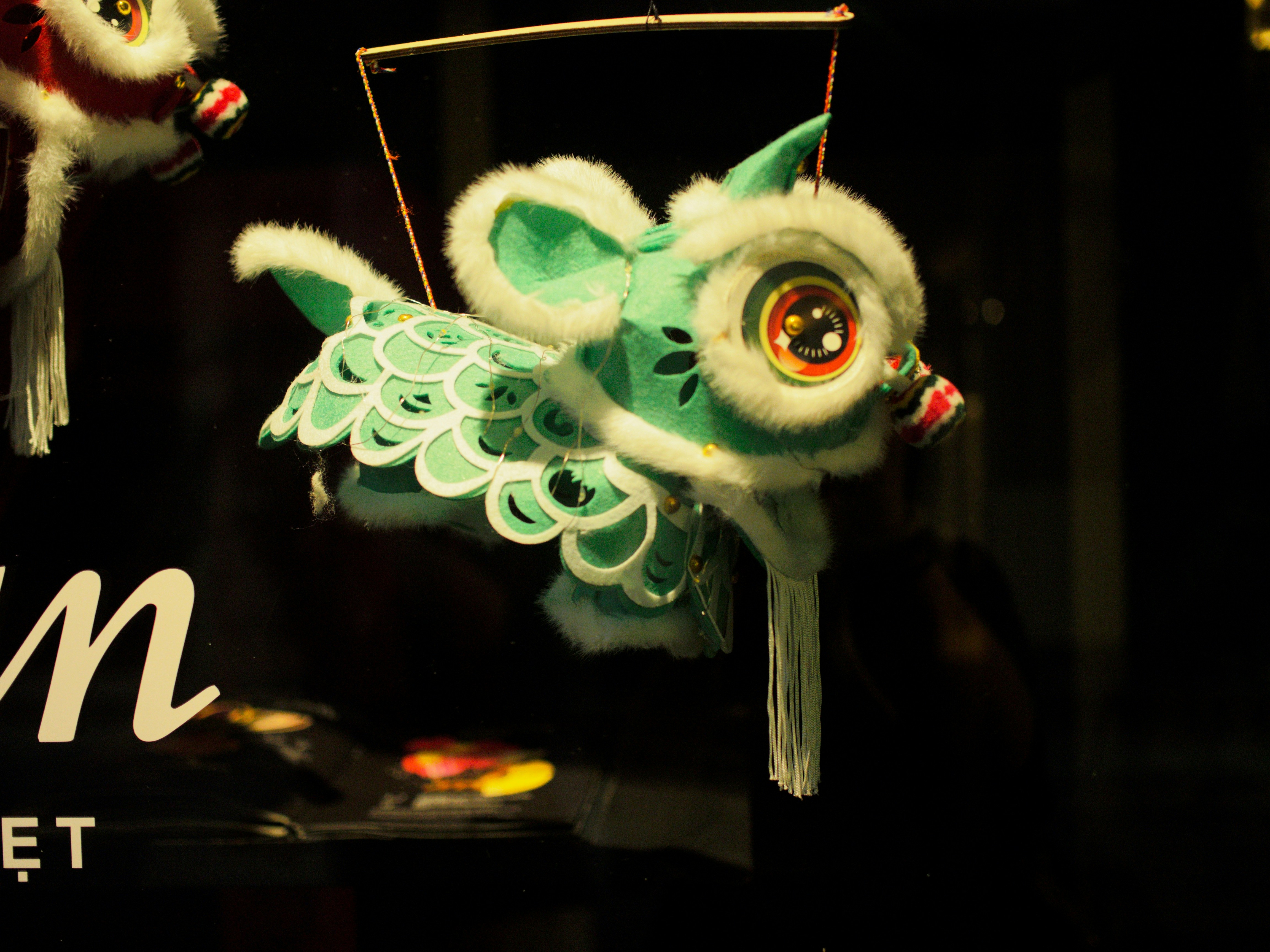 Teal felt lion dance puppet - Free Photo on Unsplash