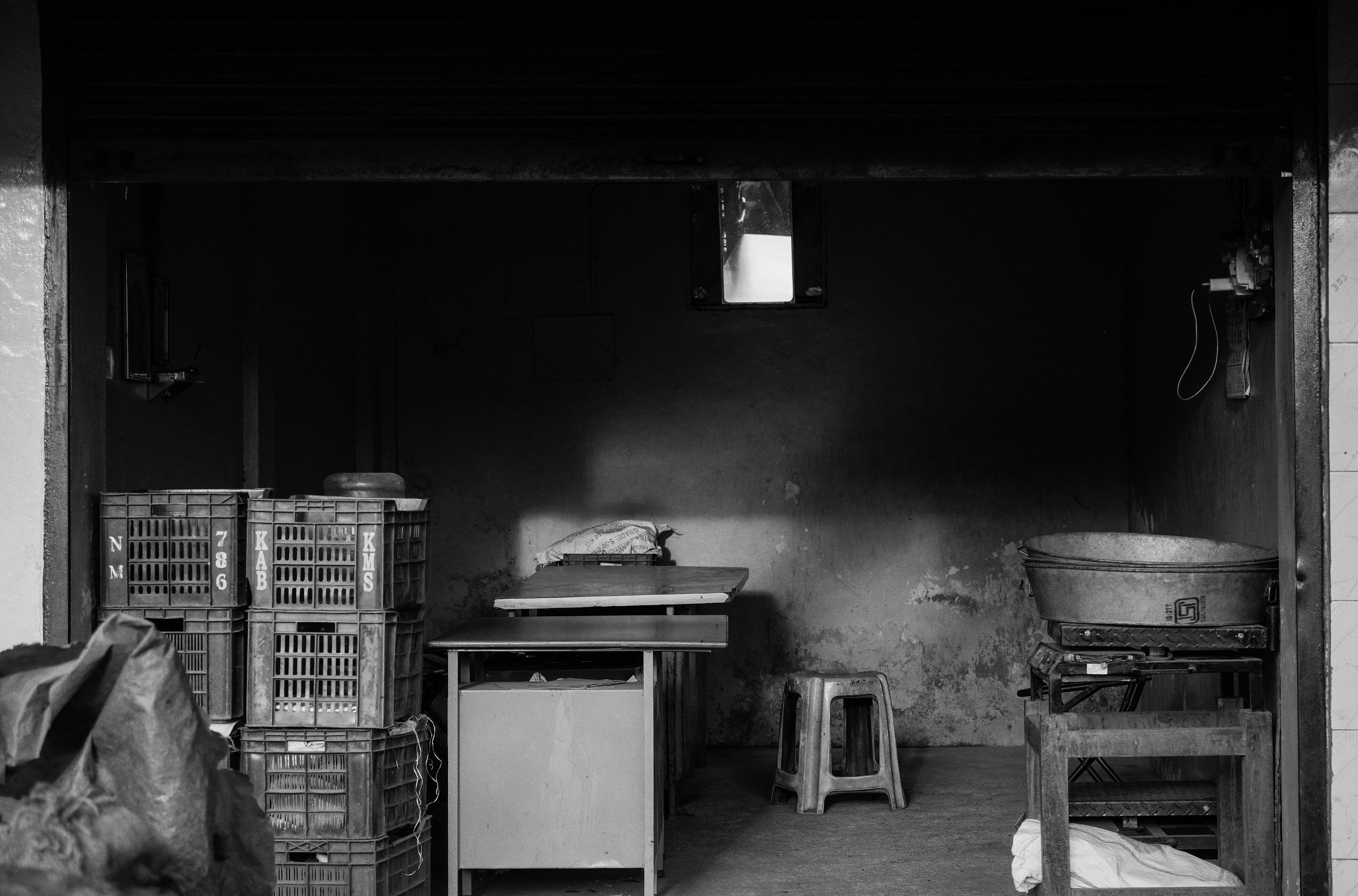 Crates and tables in dim room - Free Photo on Unsplash