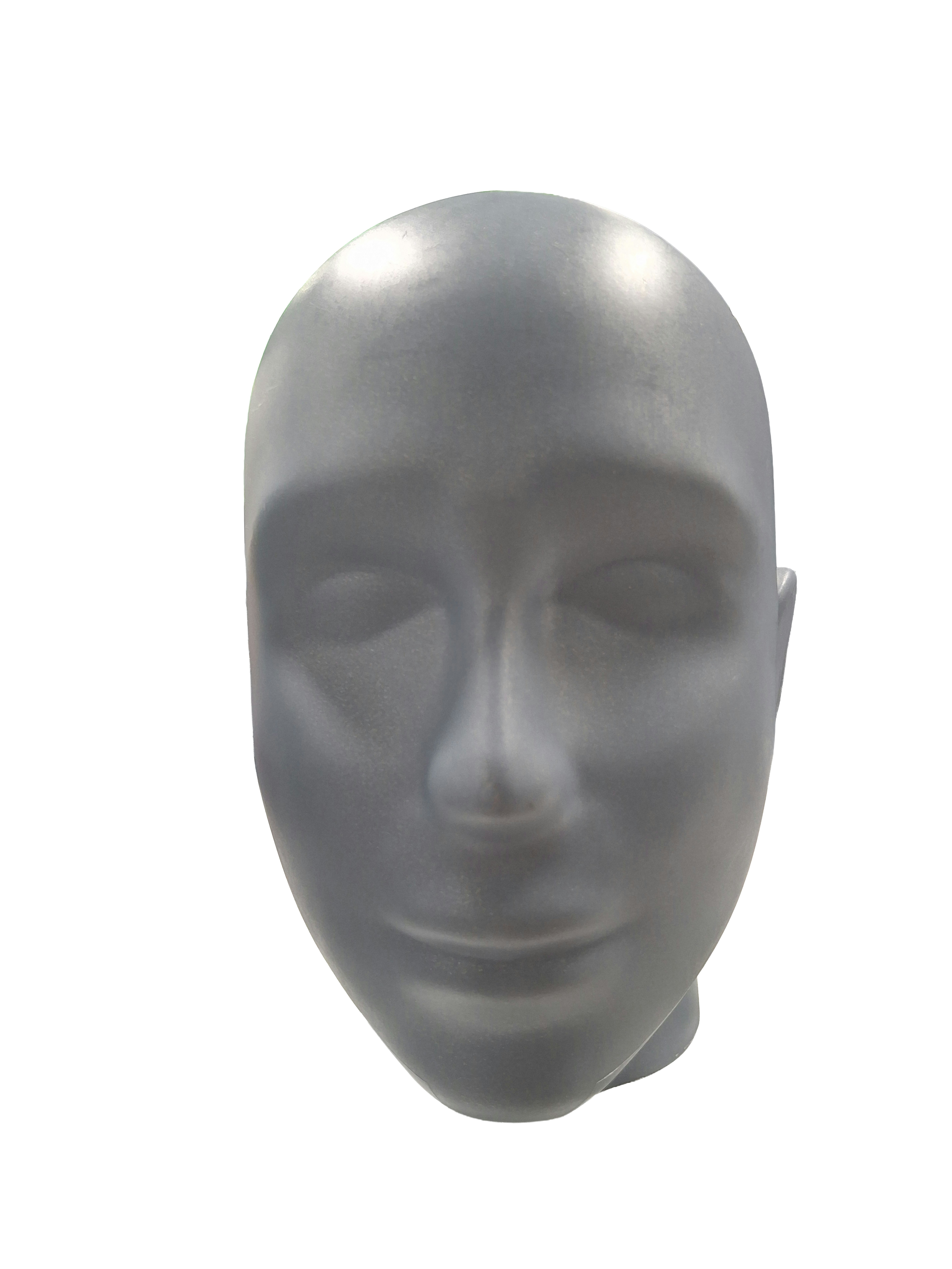 A grey mannequin head with closed eyes on a plain white background