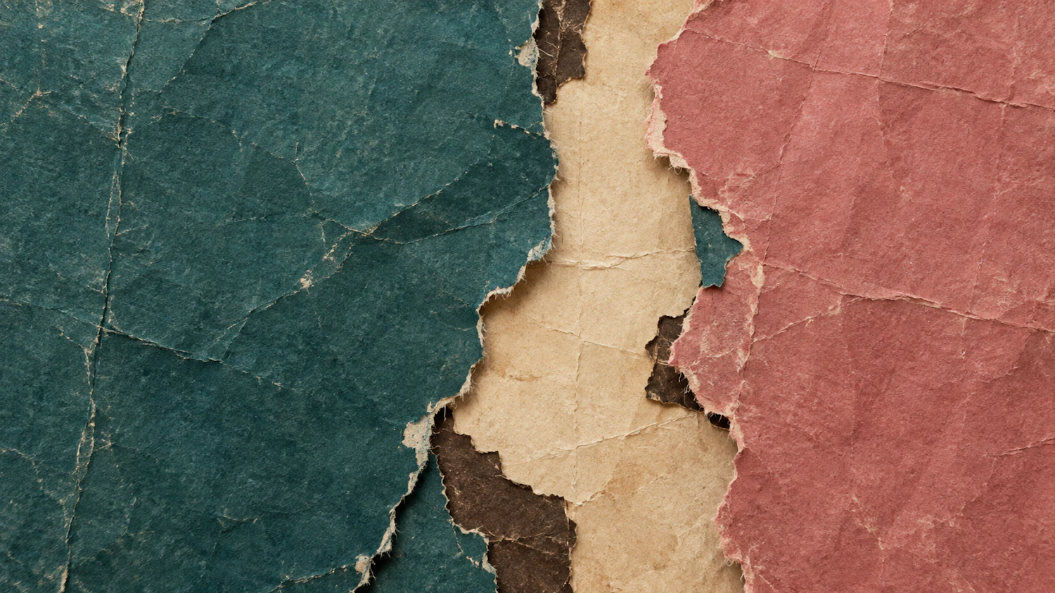 Torn fragments of teal, bone and red board overlapping