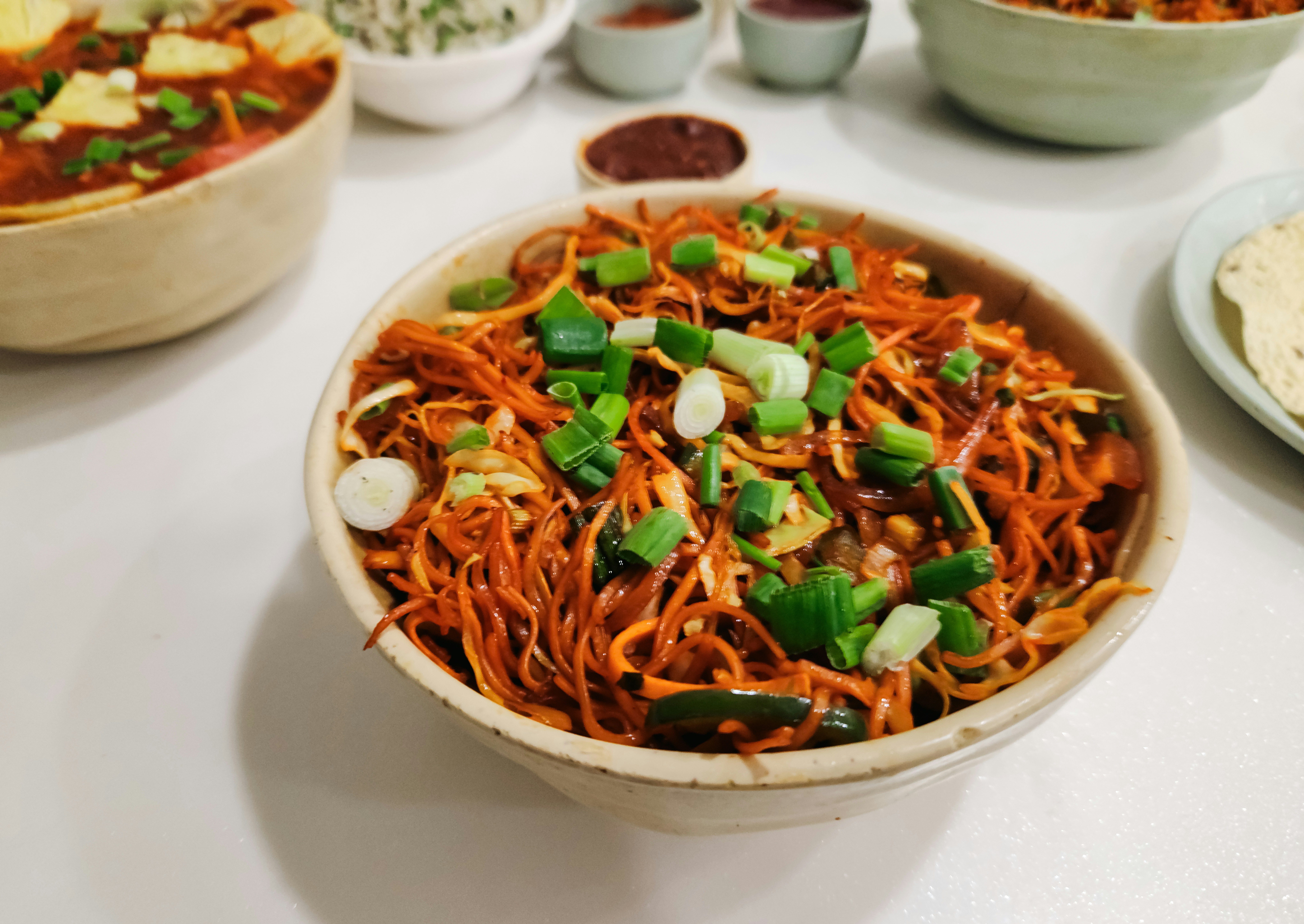 Stir-fried noodles with spring onions
