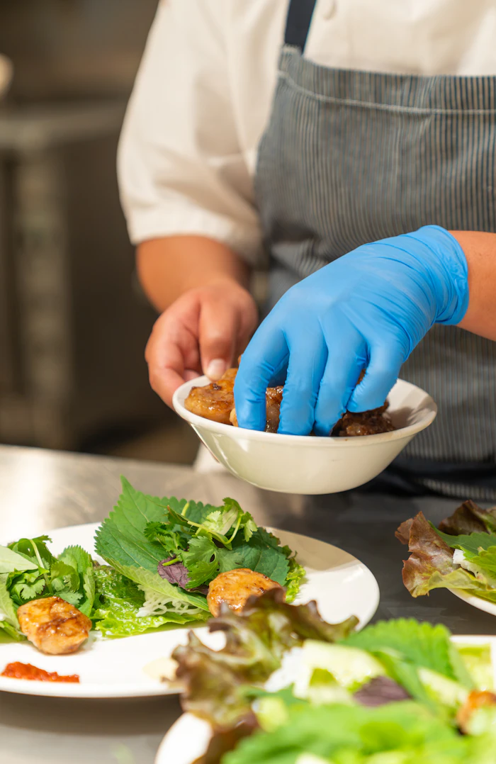 Chef plating a dish
