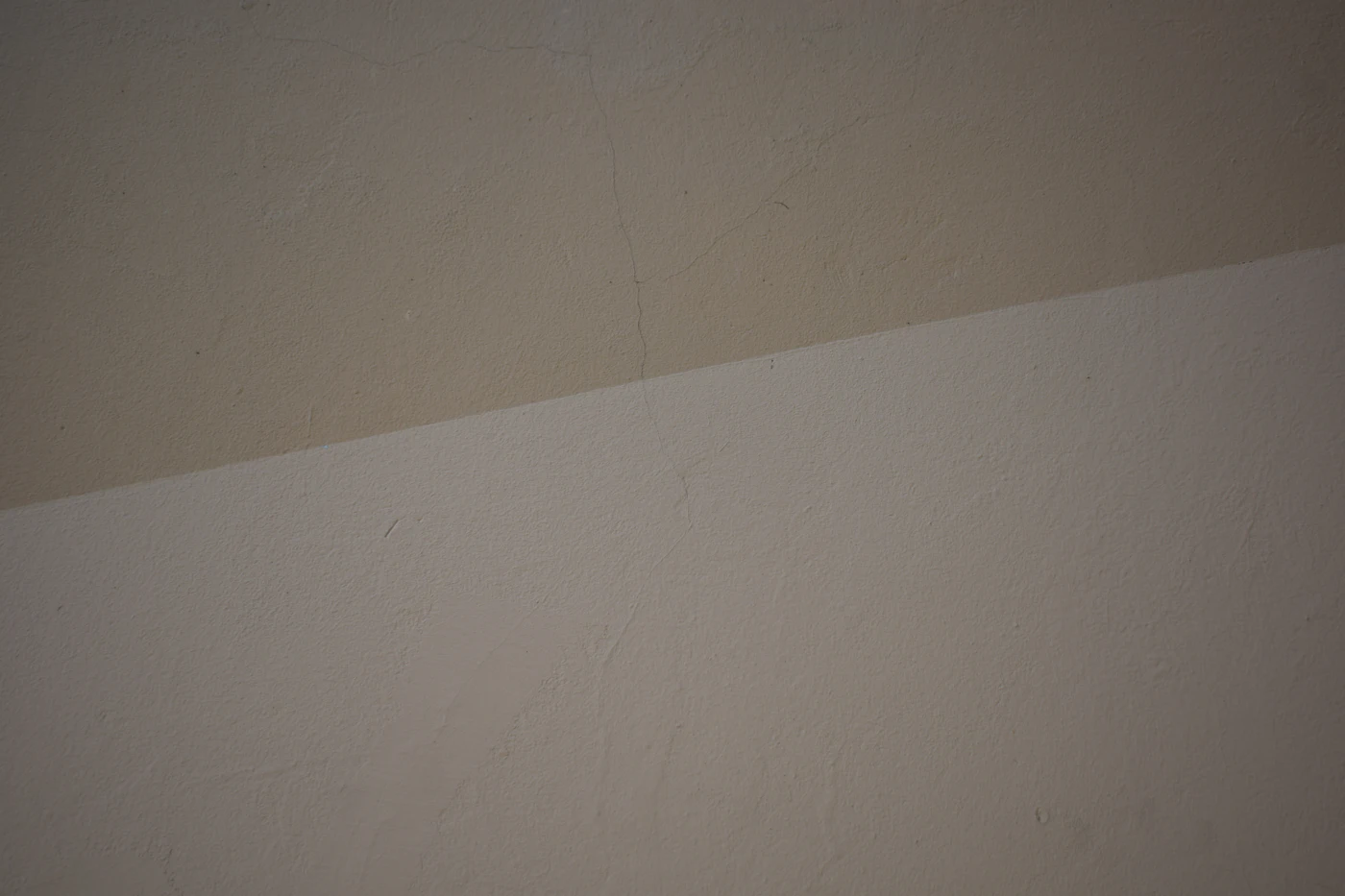 Freshly painted wall in two soft neutral tones