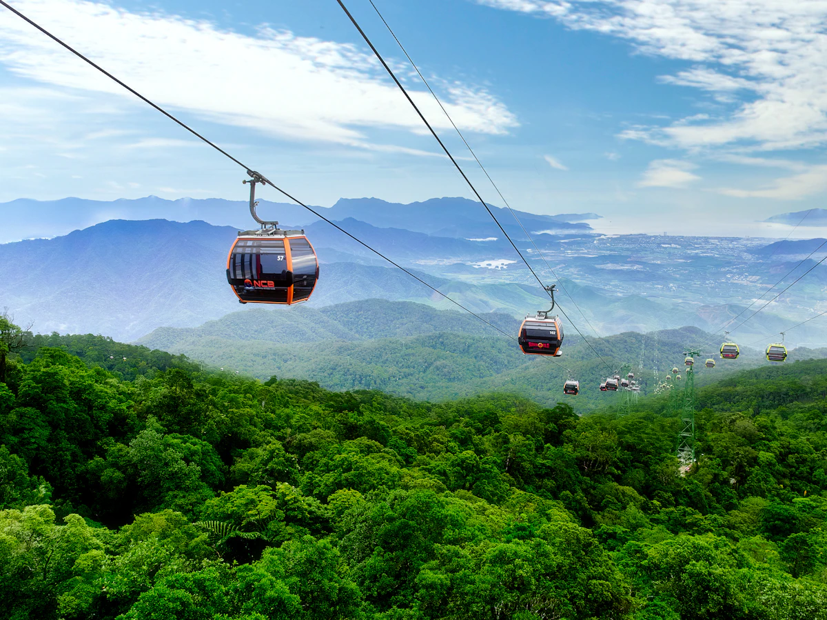 Ba Na Hills cable car system soaring above mountain jungle