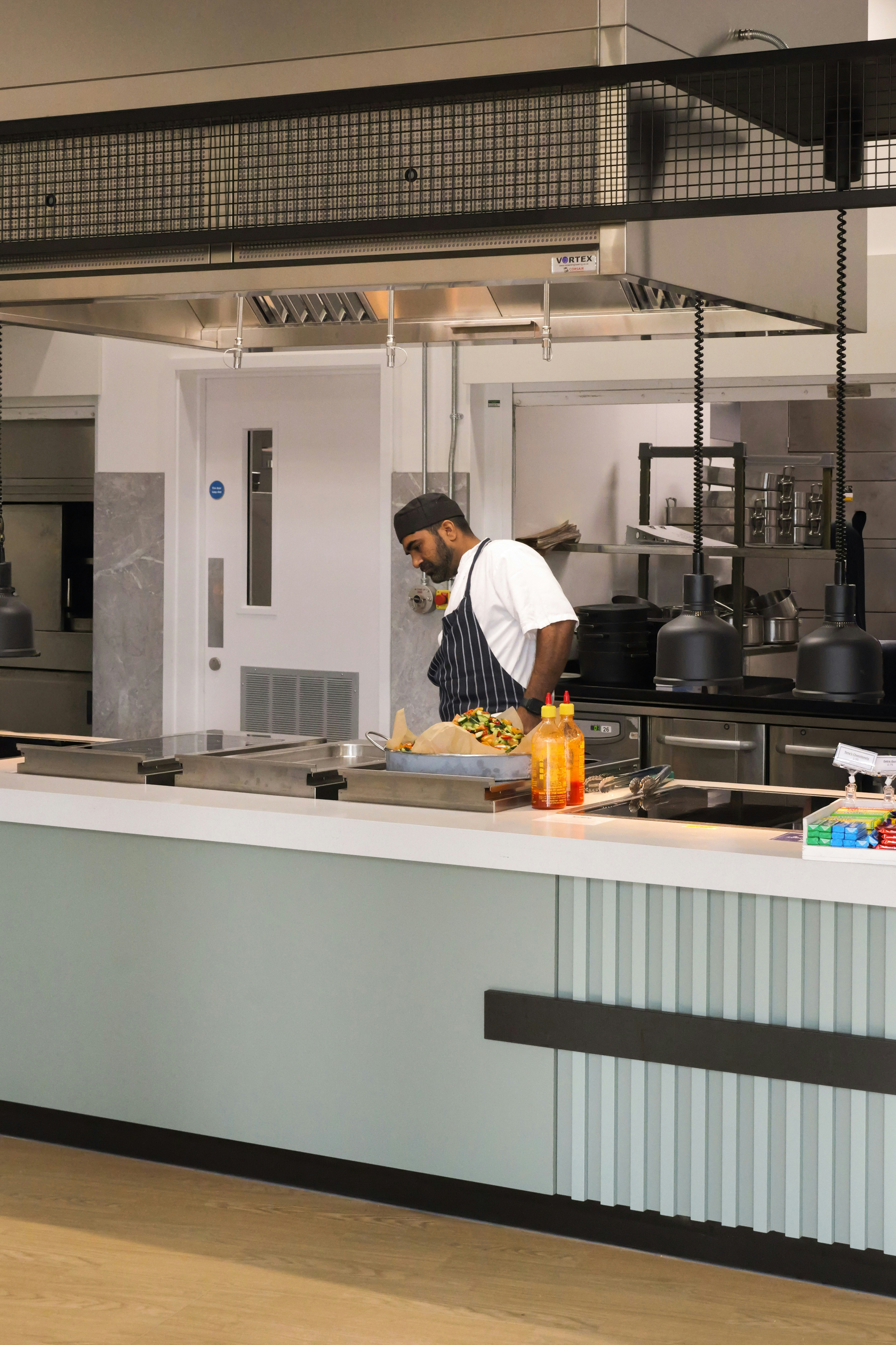Chef working in a fully operational commercial kitchen