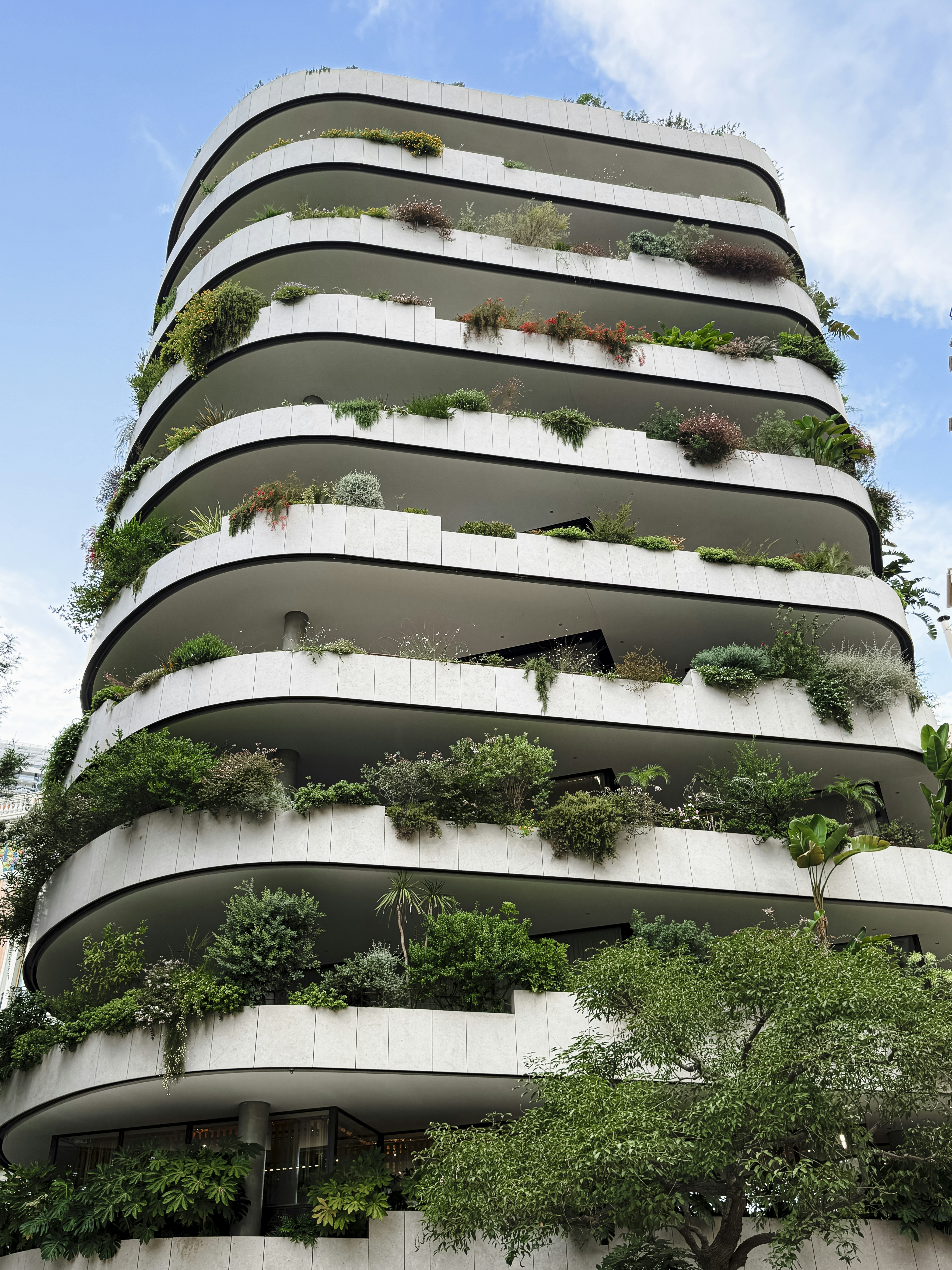 Modern residential building with green balconies - Free Photo on Unsplash