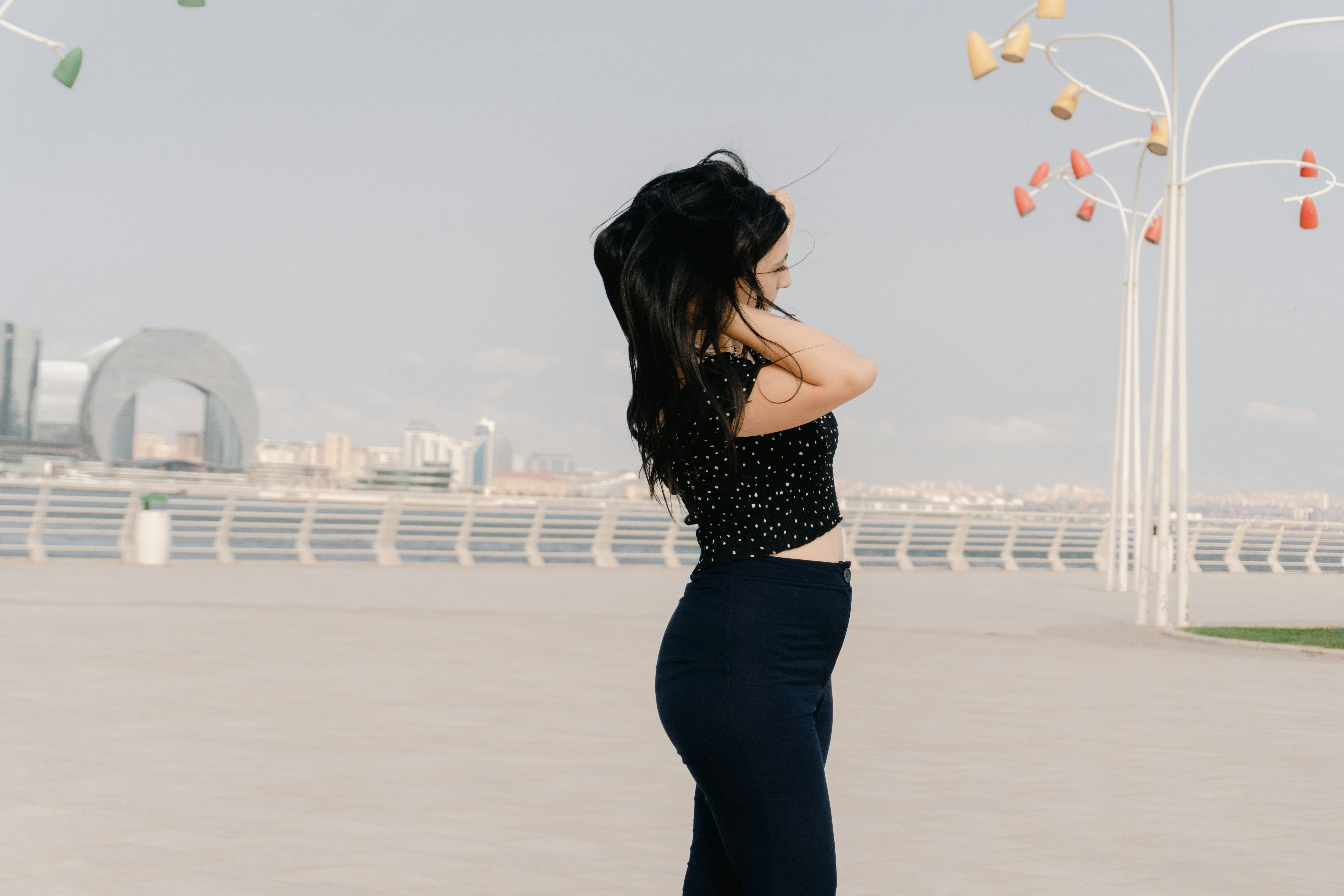 Young woman posing for a street-style photo