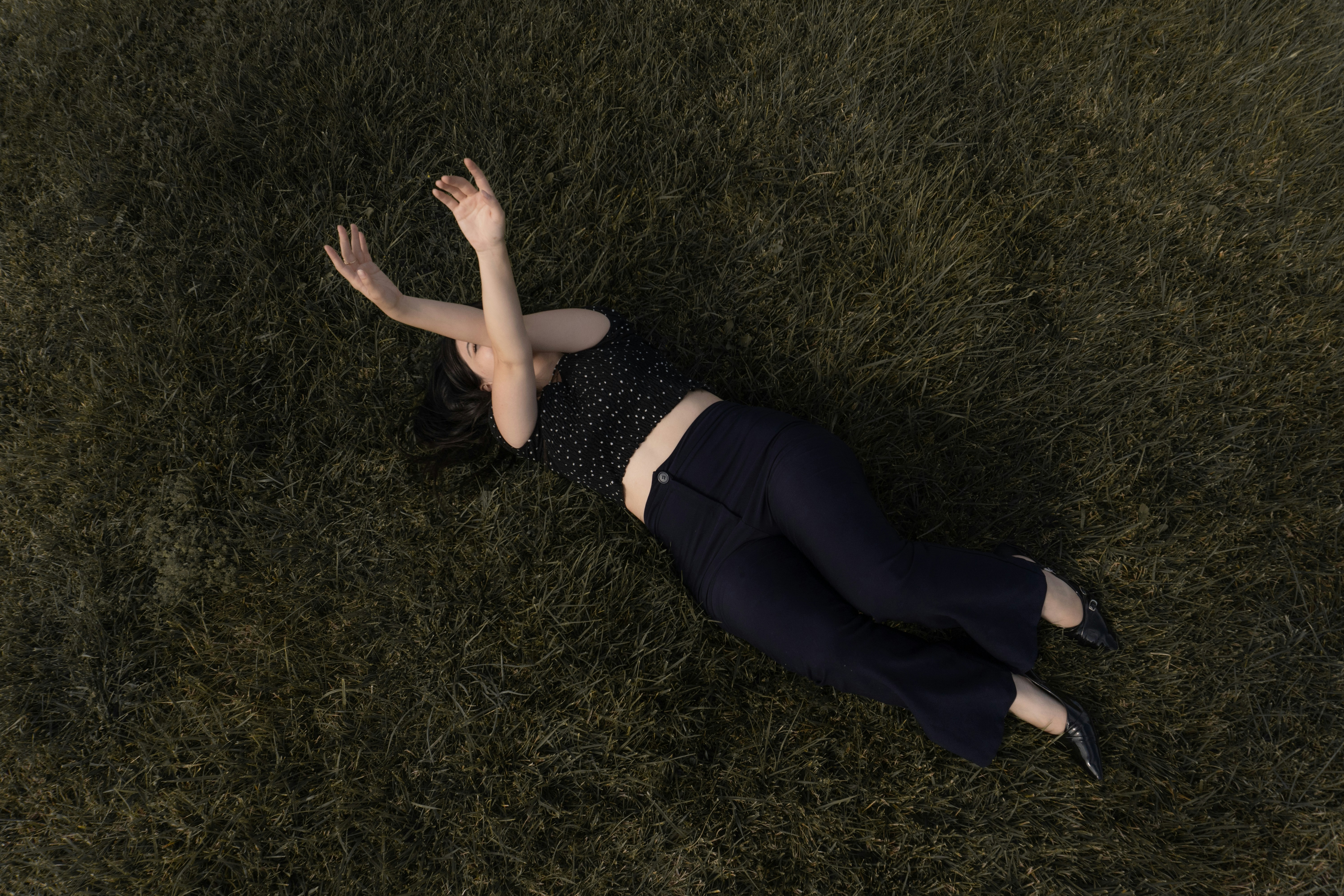 Woman lying on green grass - Free Photo on Unsplash