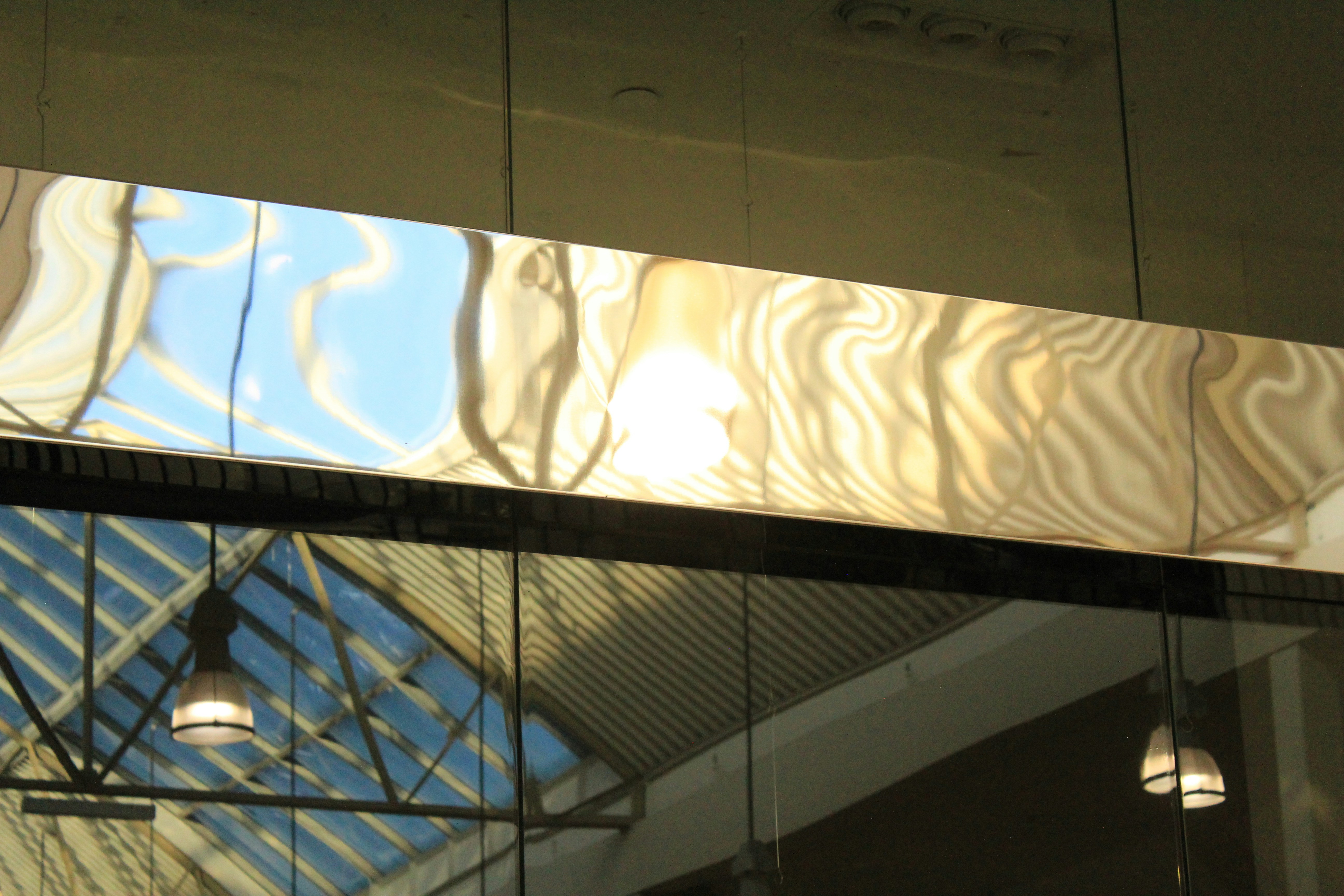 Bookmatched Marble and Backlit Onyx for Luxury Hotel Lobbies