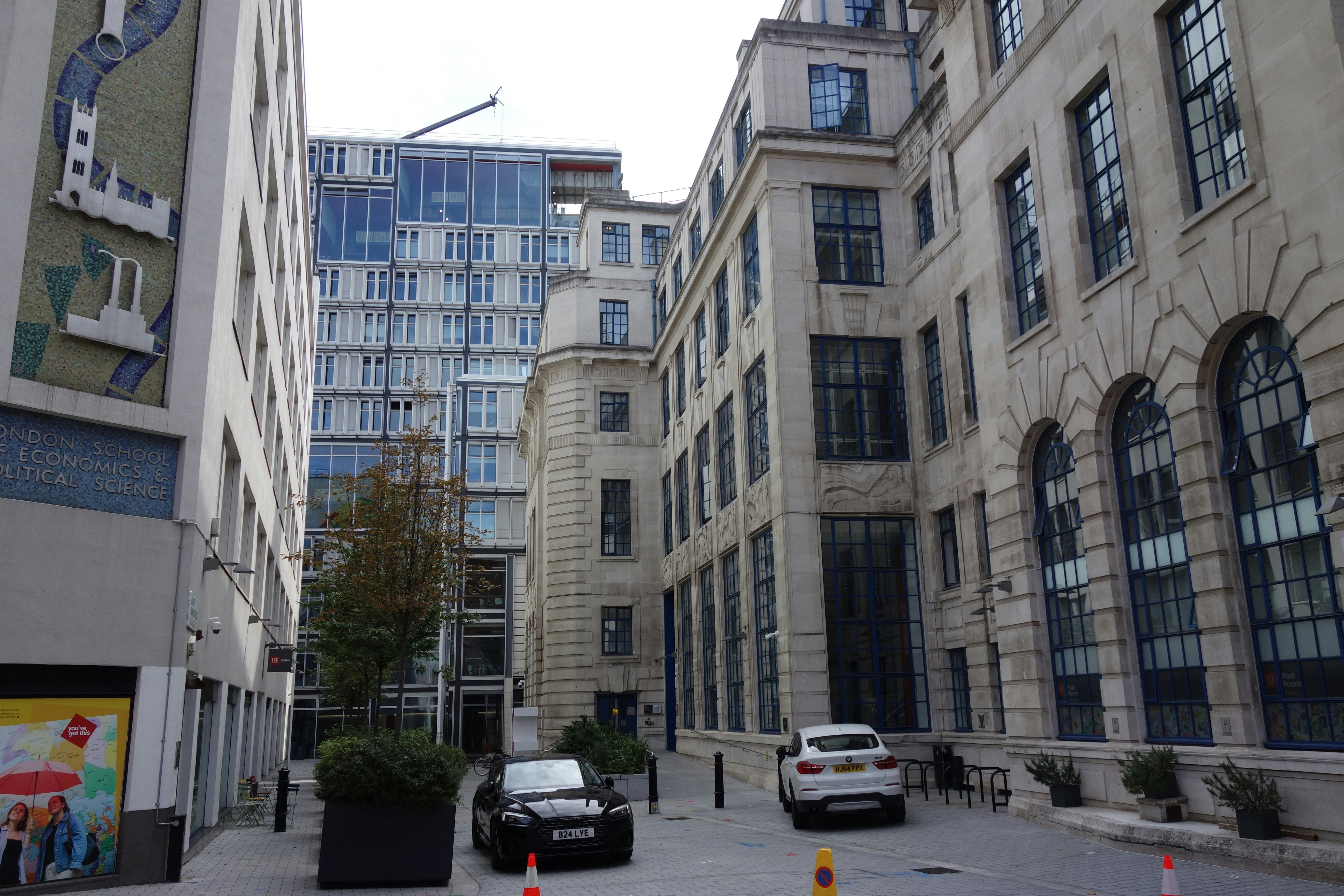 A narrow street between stone buildings at the London School of Economics in London